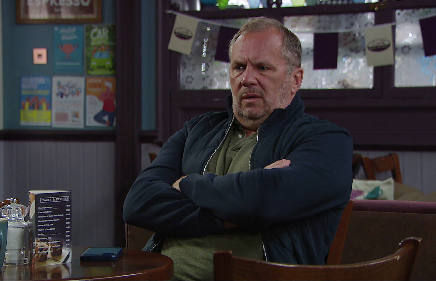 Will with his arms crossed on Emmerdale