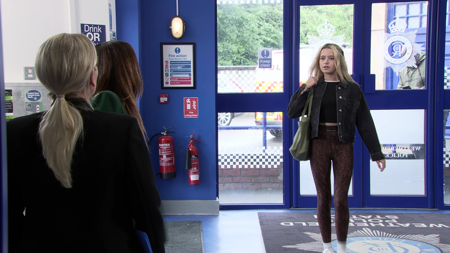 Betsy at the station as Carla and Swain talk