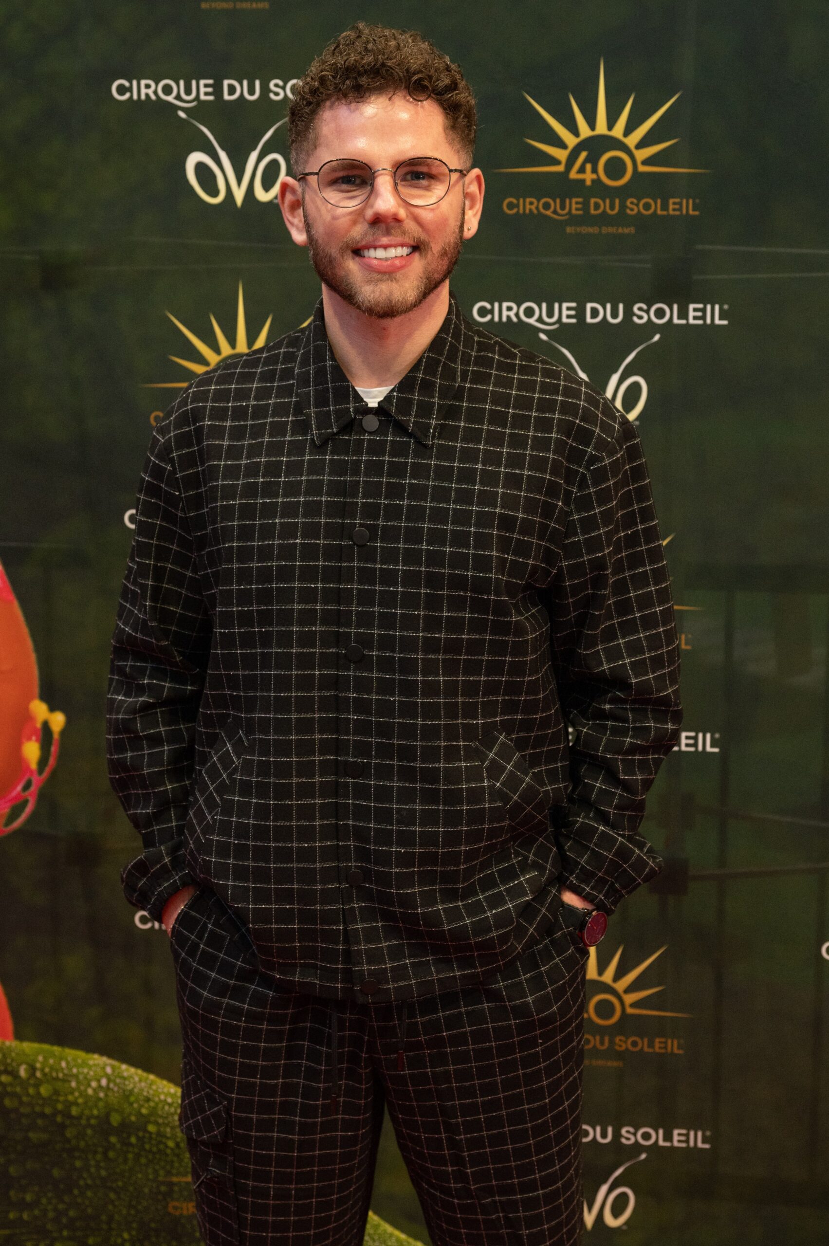 Dean McCullough smiling at event