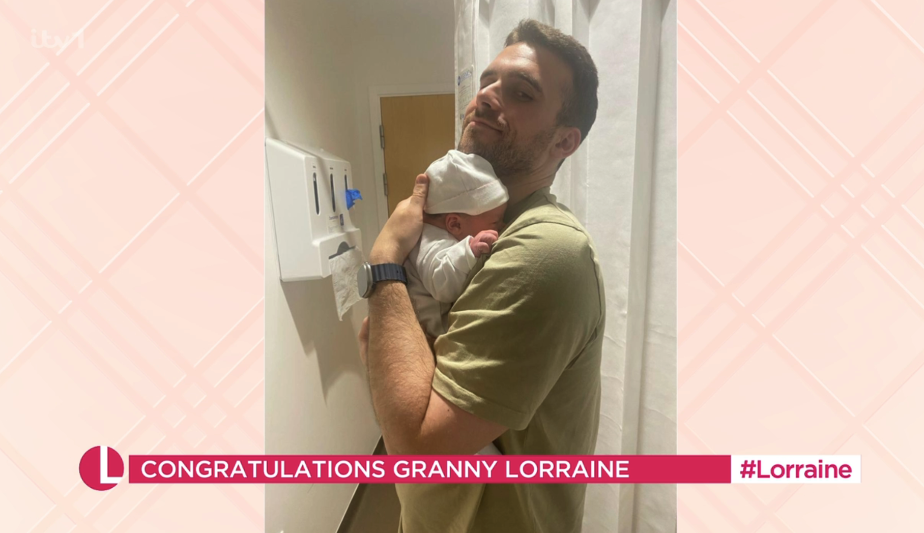 Rosie Kelly's boyfriend holding their baby