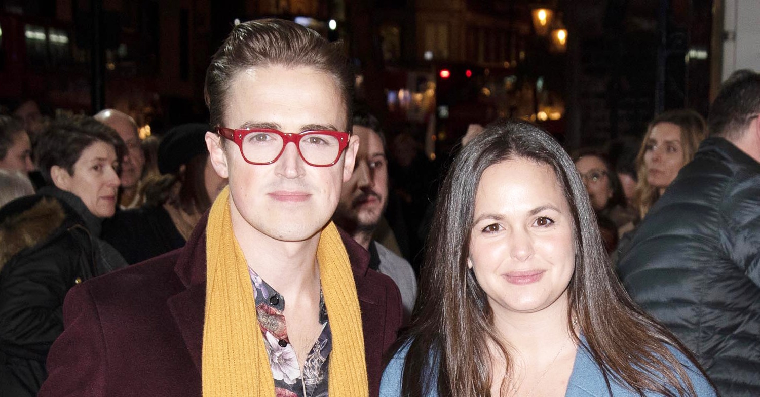 Tom Fletcher and Giovanna Fletcher smiling at the camera