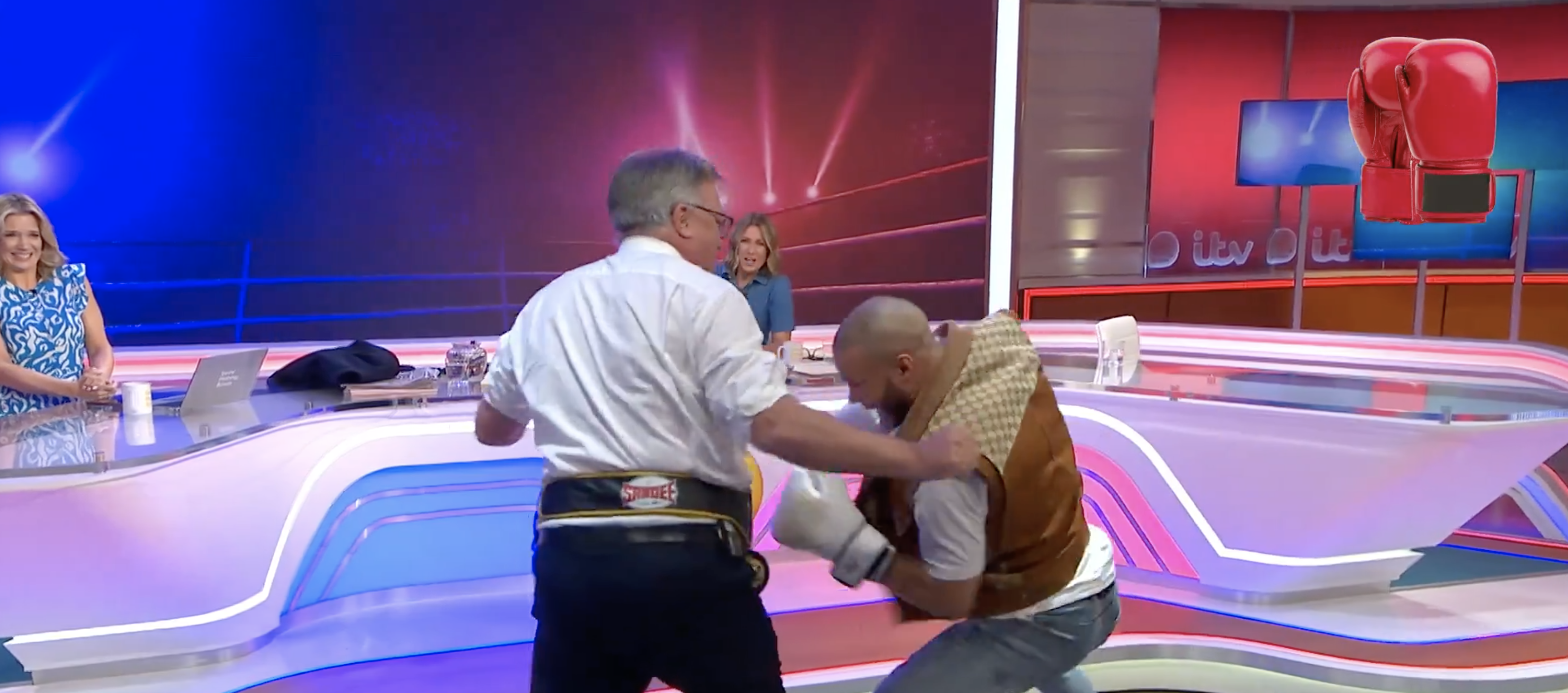 Ed Balls facing pro boxer Chris Eubank Jr. in a humorous sparring competition on GMB today