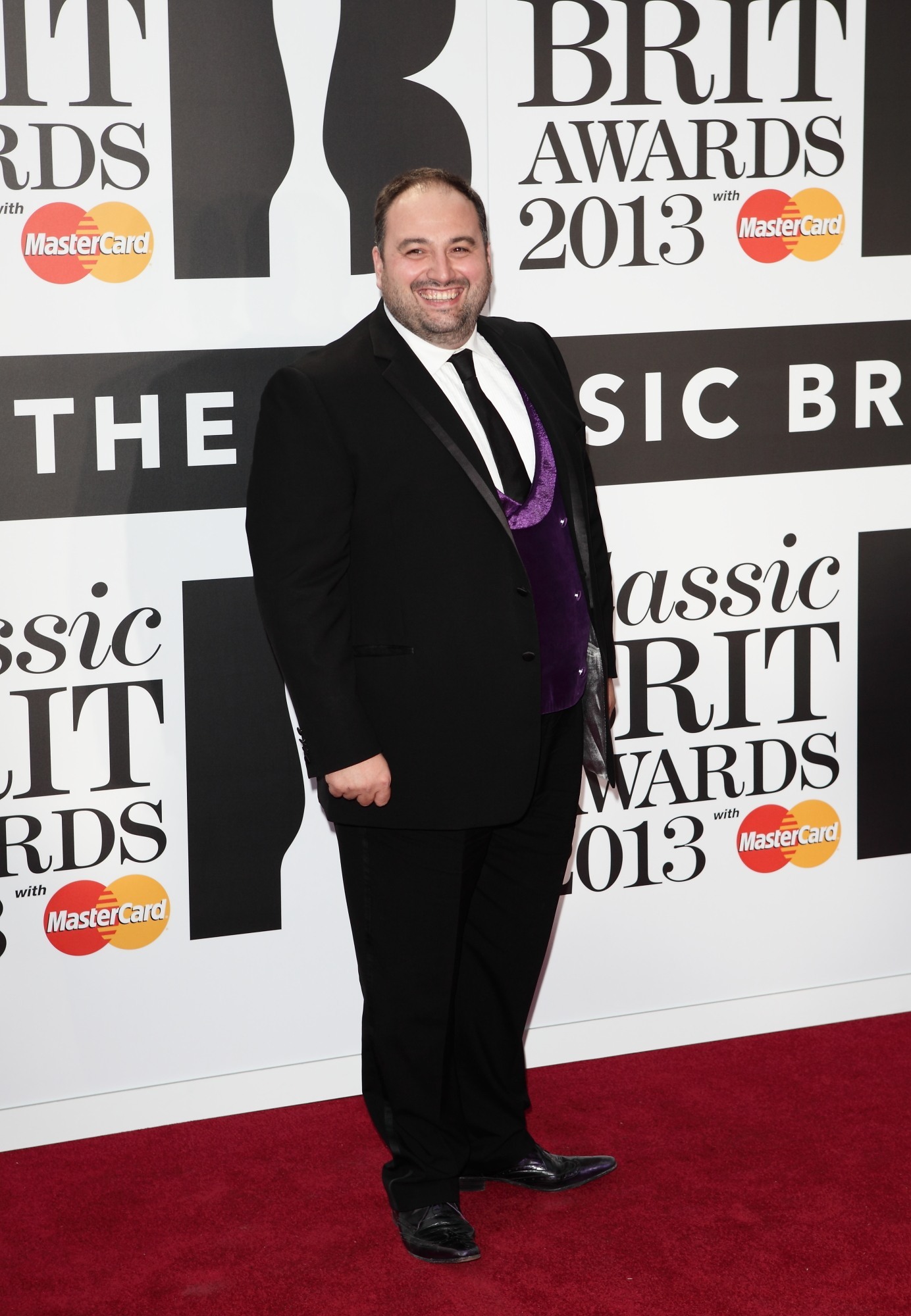 Wynne Evans smiling at the BRITs