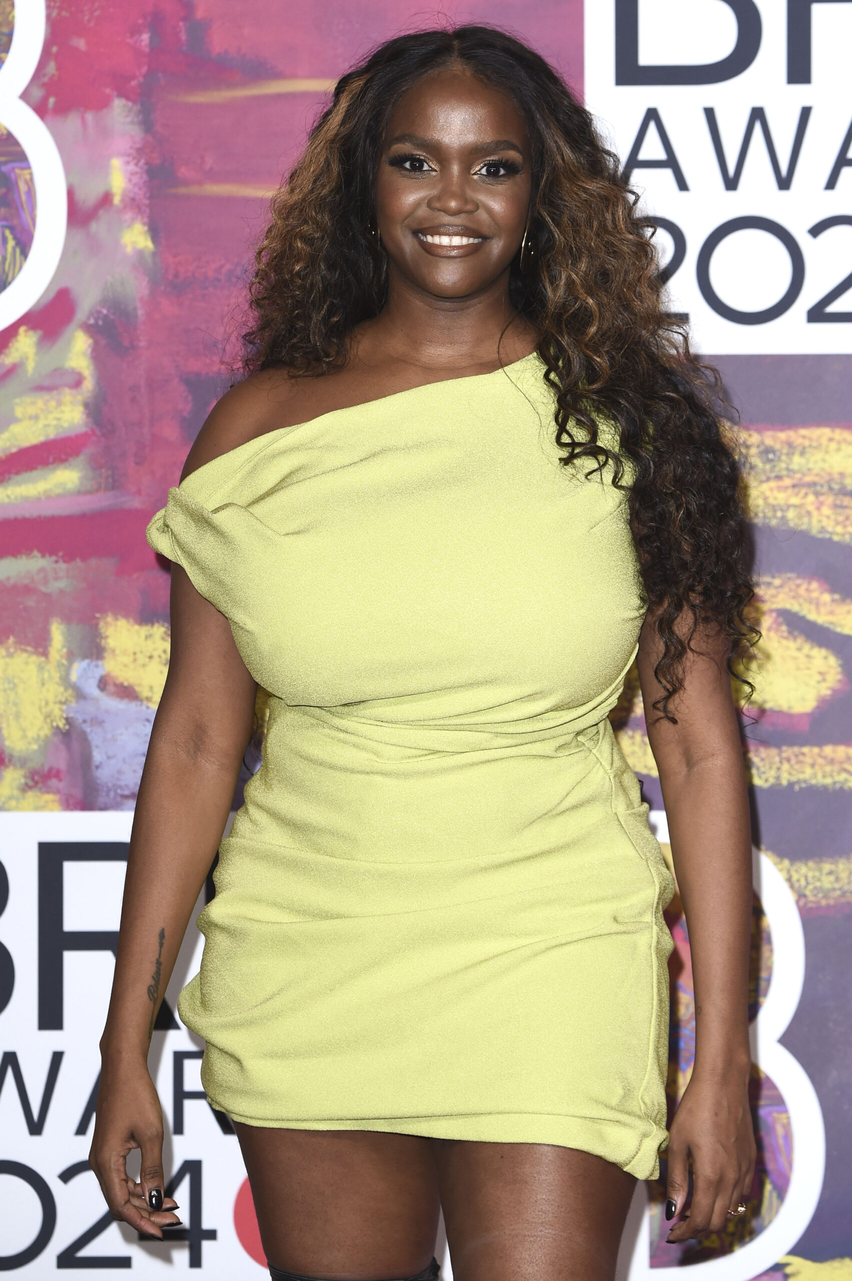 Oti Mabuse smiling at the BRITs