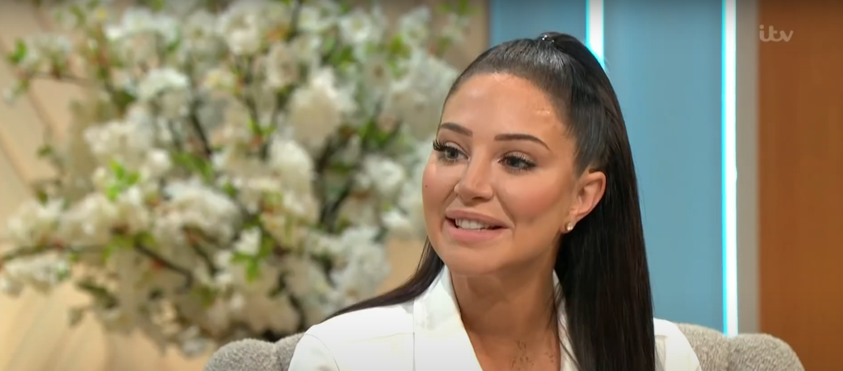 Tulisa Contostavlos smiling on Lorraine