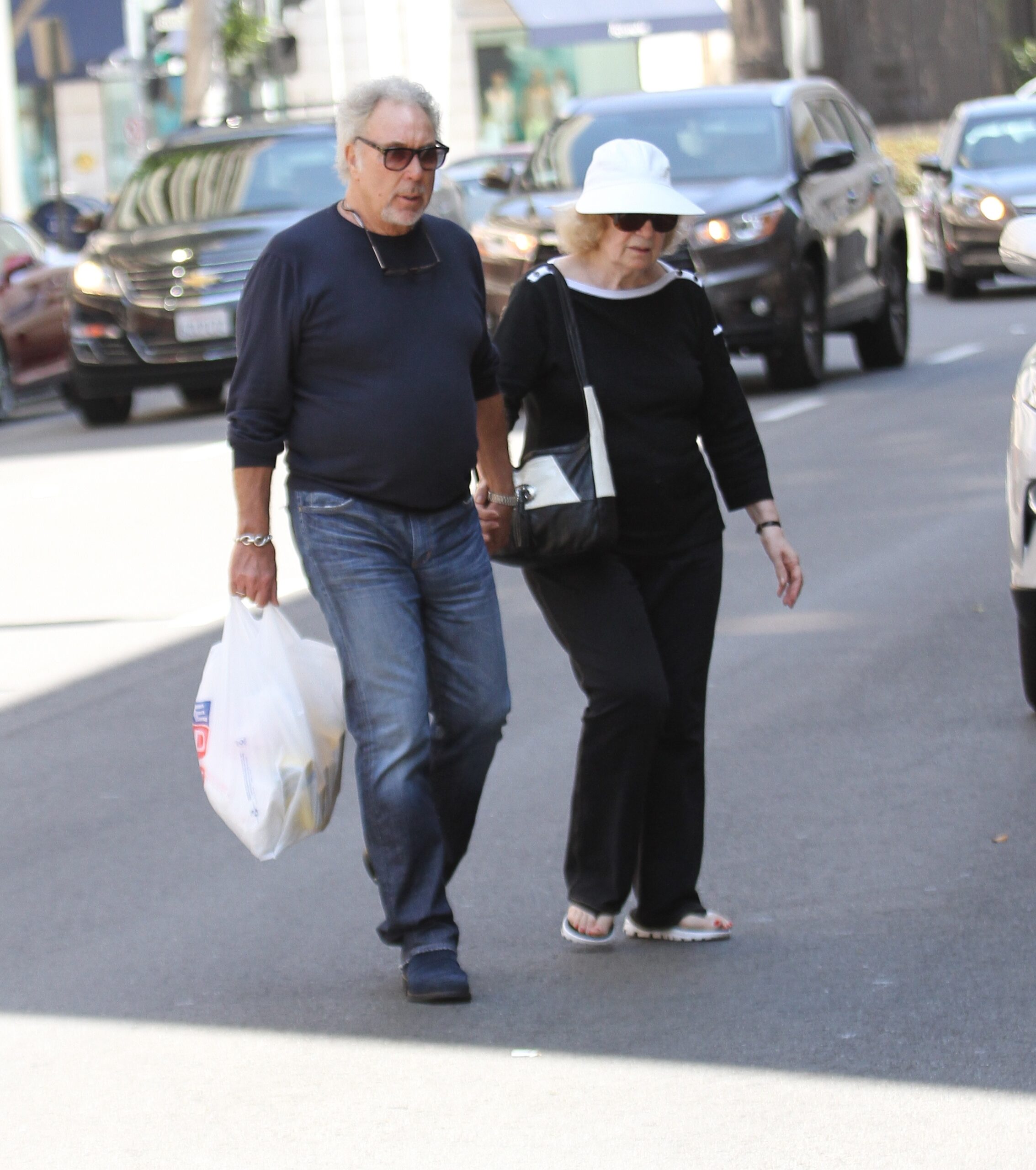 Tom Jones and wife Linda walking