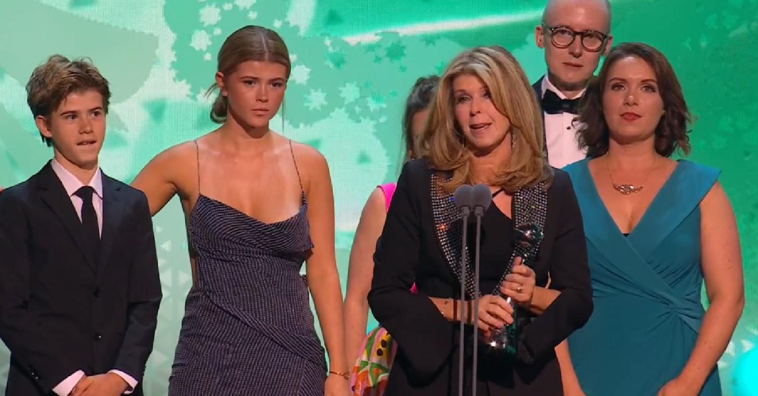 Kate Garraway with her children on stage at the NTAs
