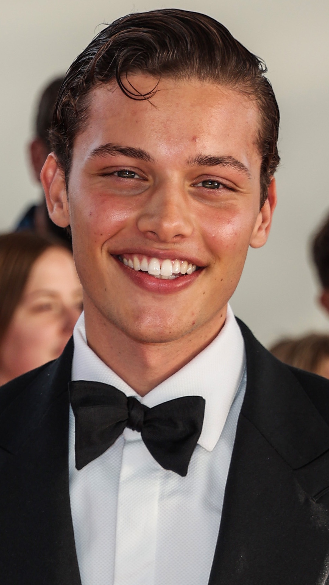 Bobby Brazier at the 2024 NTAs wearing a tuxedo and smiling