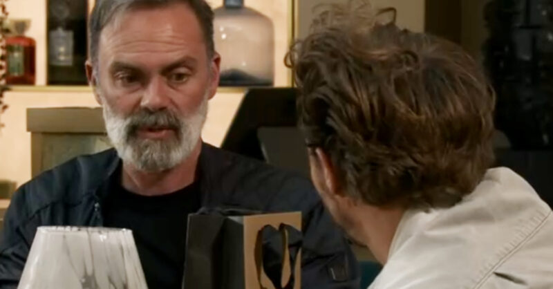 Coronation Street's Billy and David at the hotel with a gift bag