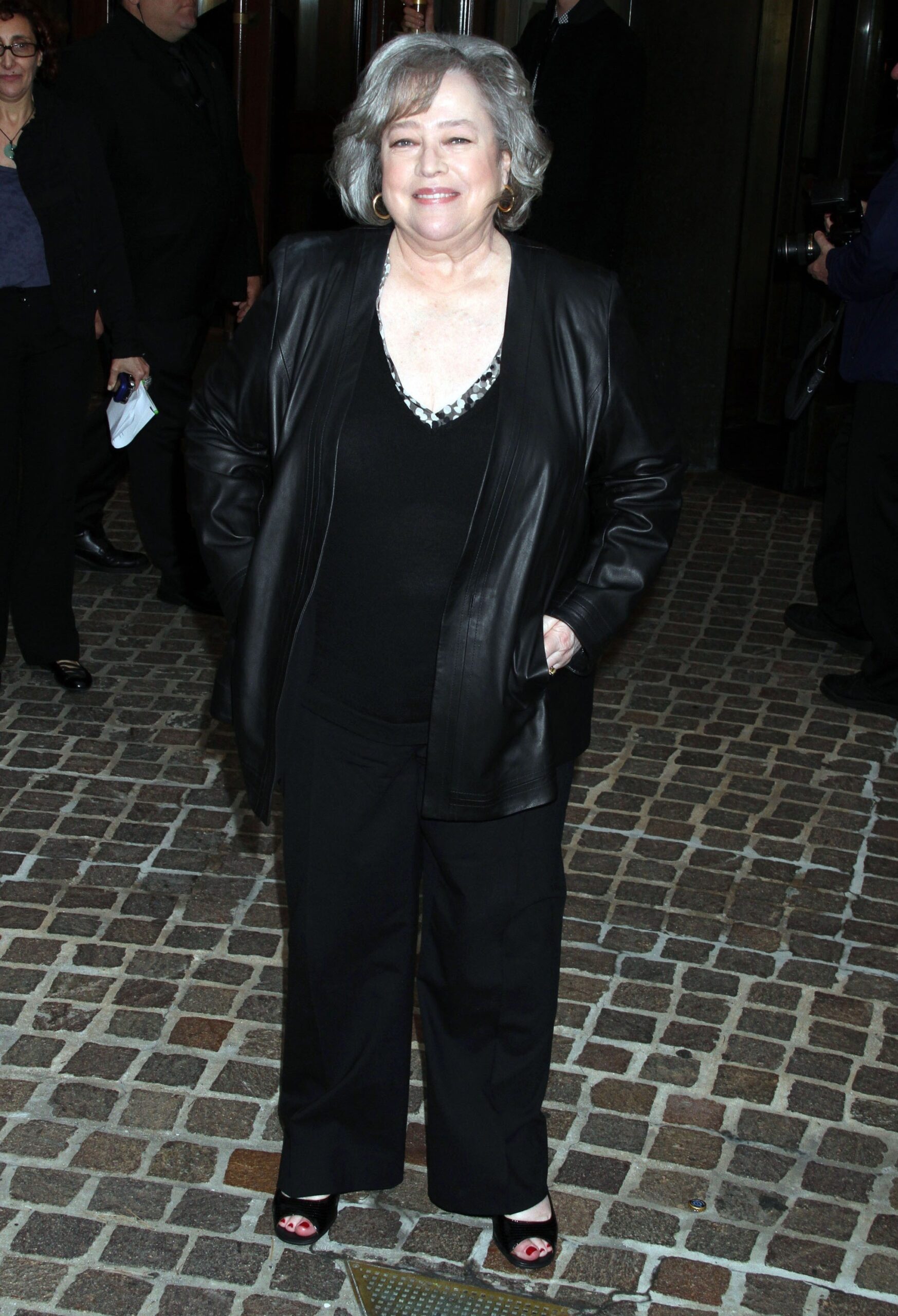 Kathy Bates smiling at event in 2011