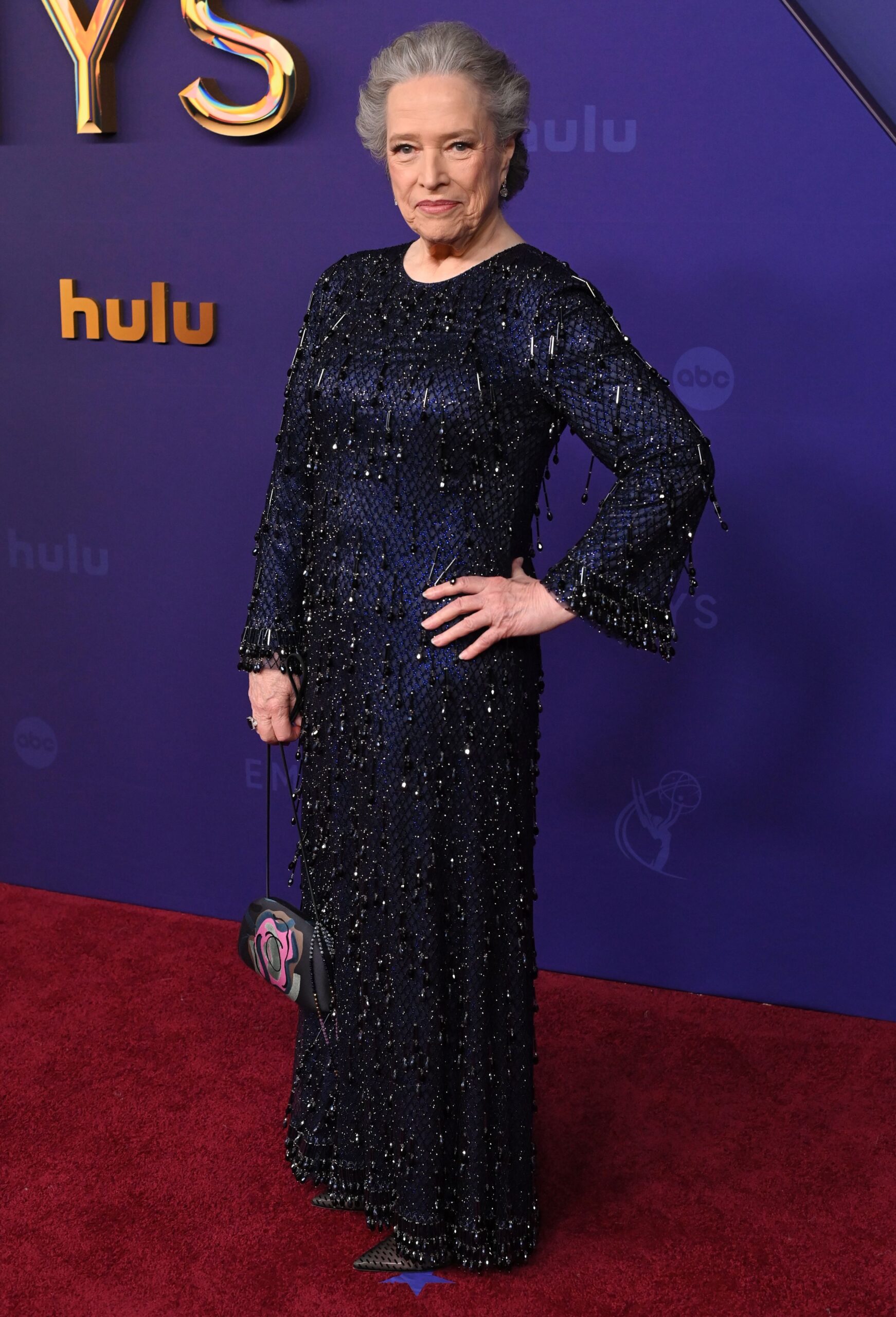 Kathy Bates smiling on red carpet at the Emmys 2024
