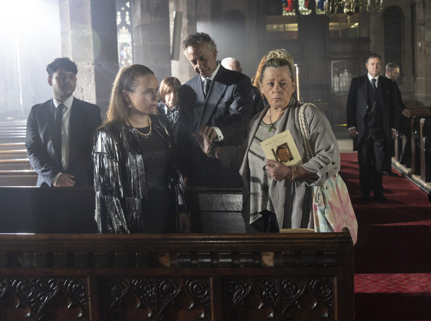 Paul's family at his funeral on Corrie