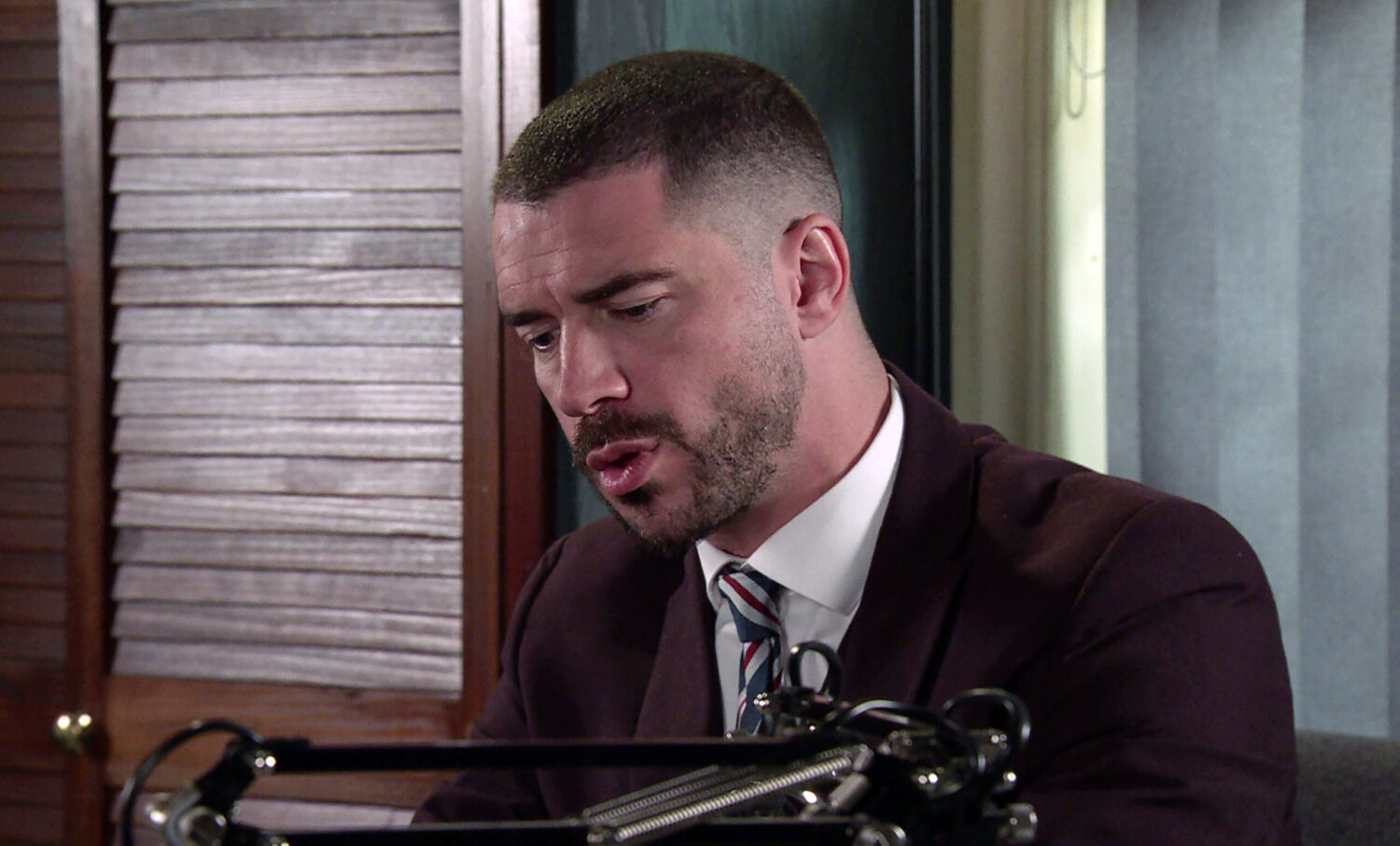 Coronation Street's Adam is serious in his office