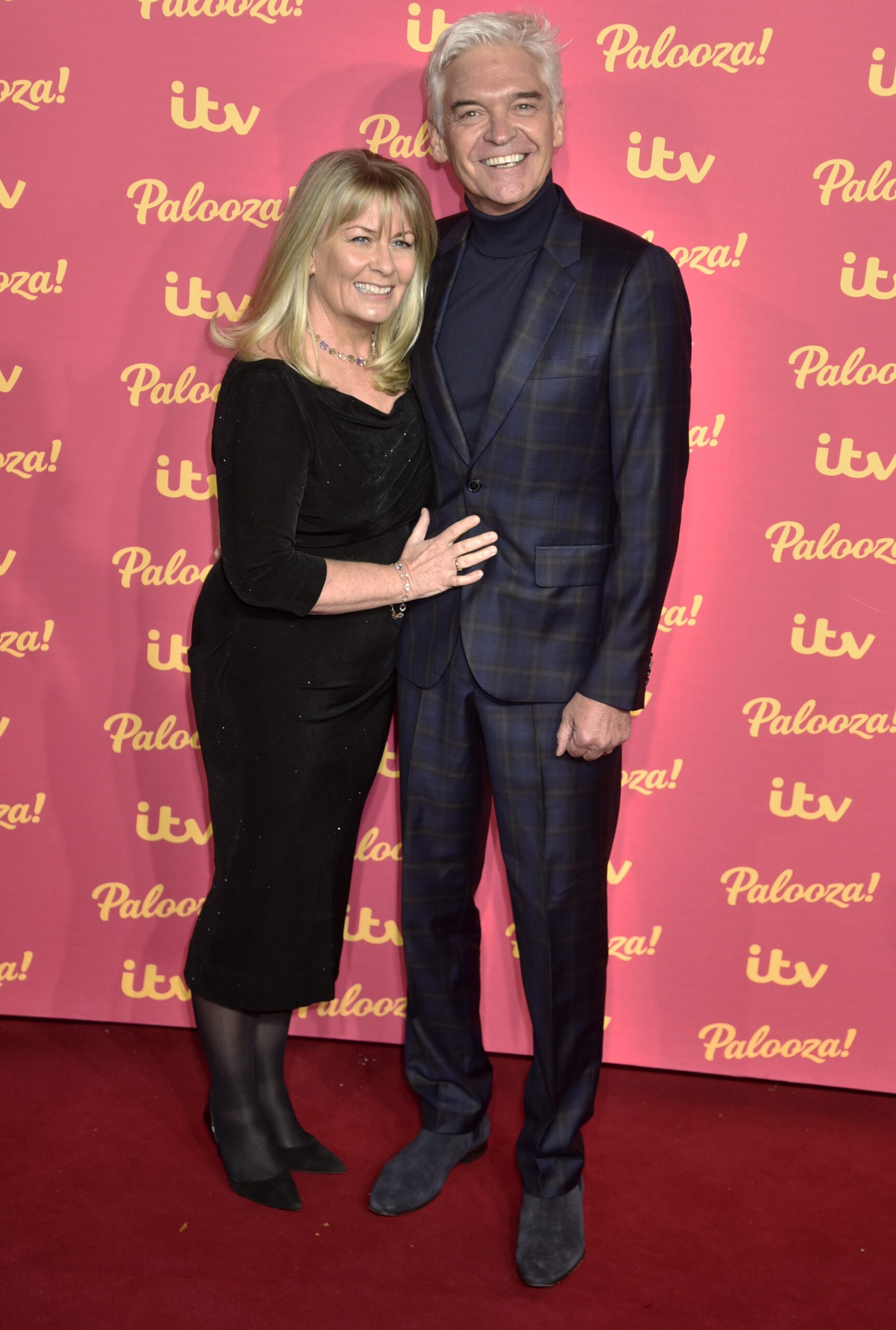 Phillip Schofield smiling with wife Steph at the ITV Palooza