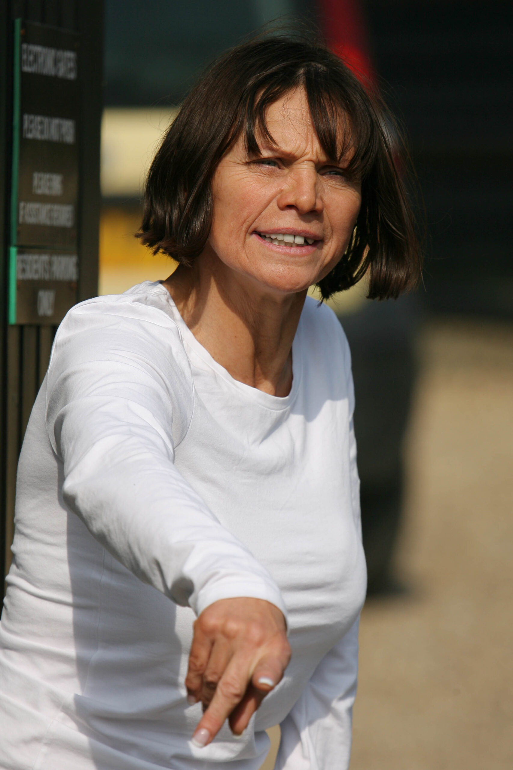 Jackiey Budden looking angry in a white top