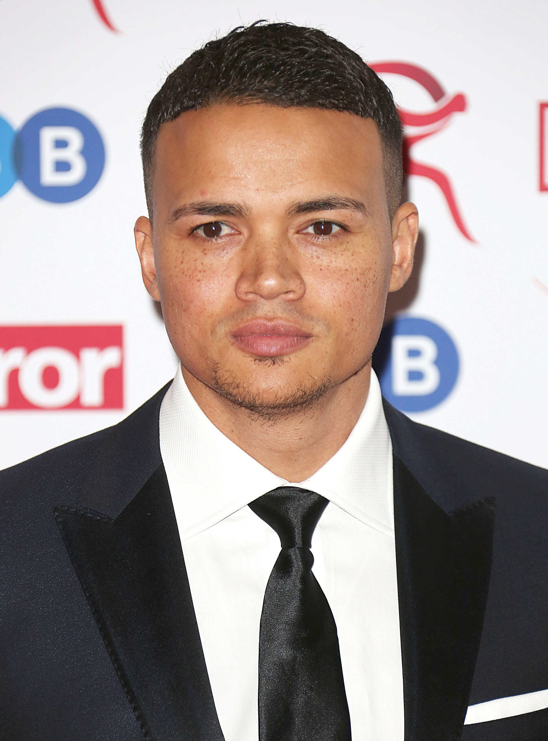 Jermaine Jenas posing at event