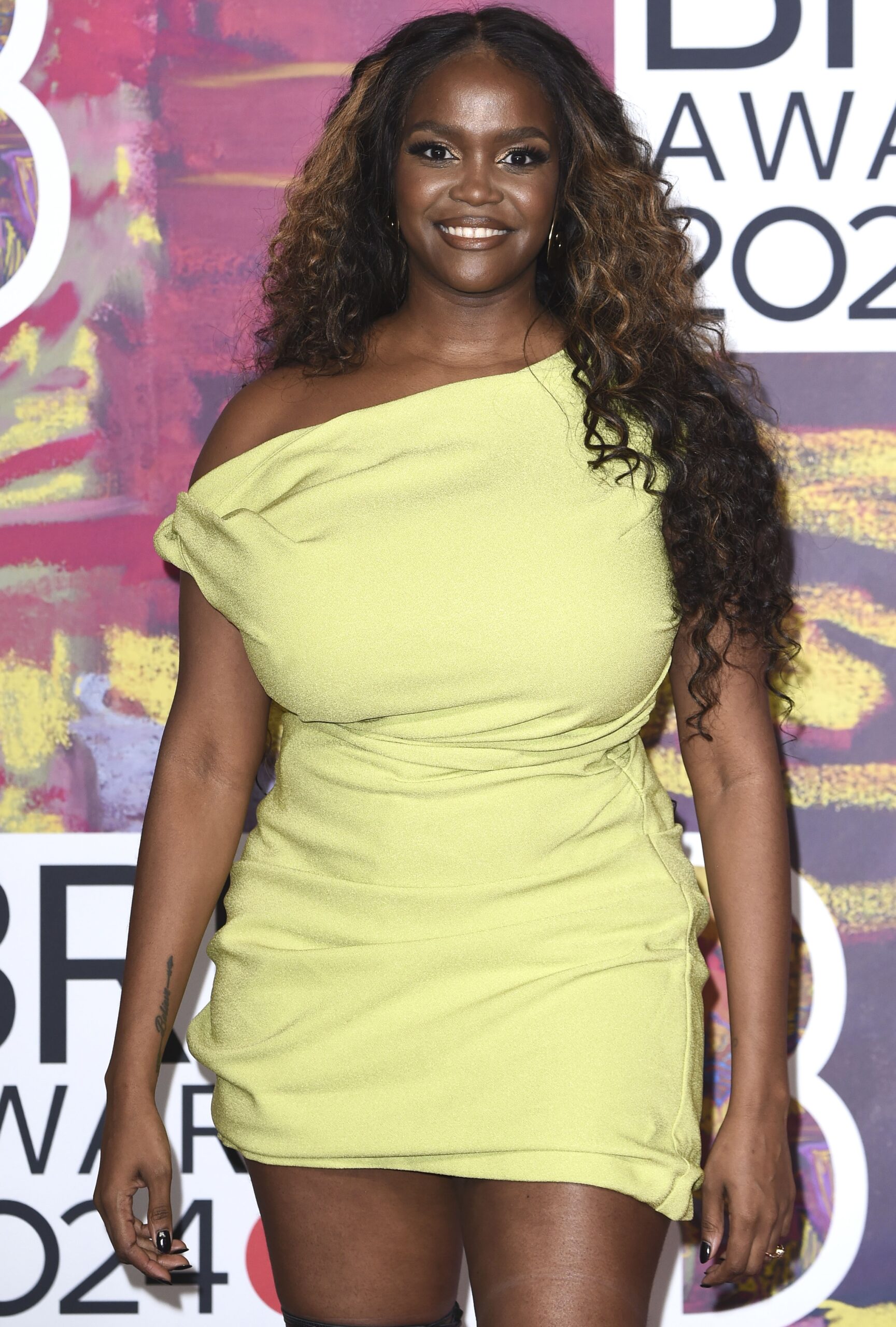 Oti Mabuse smiling at the BRITs