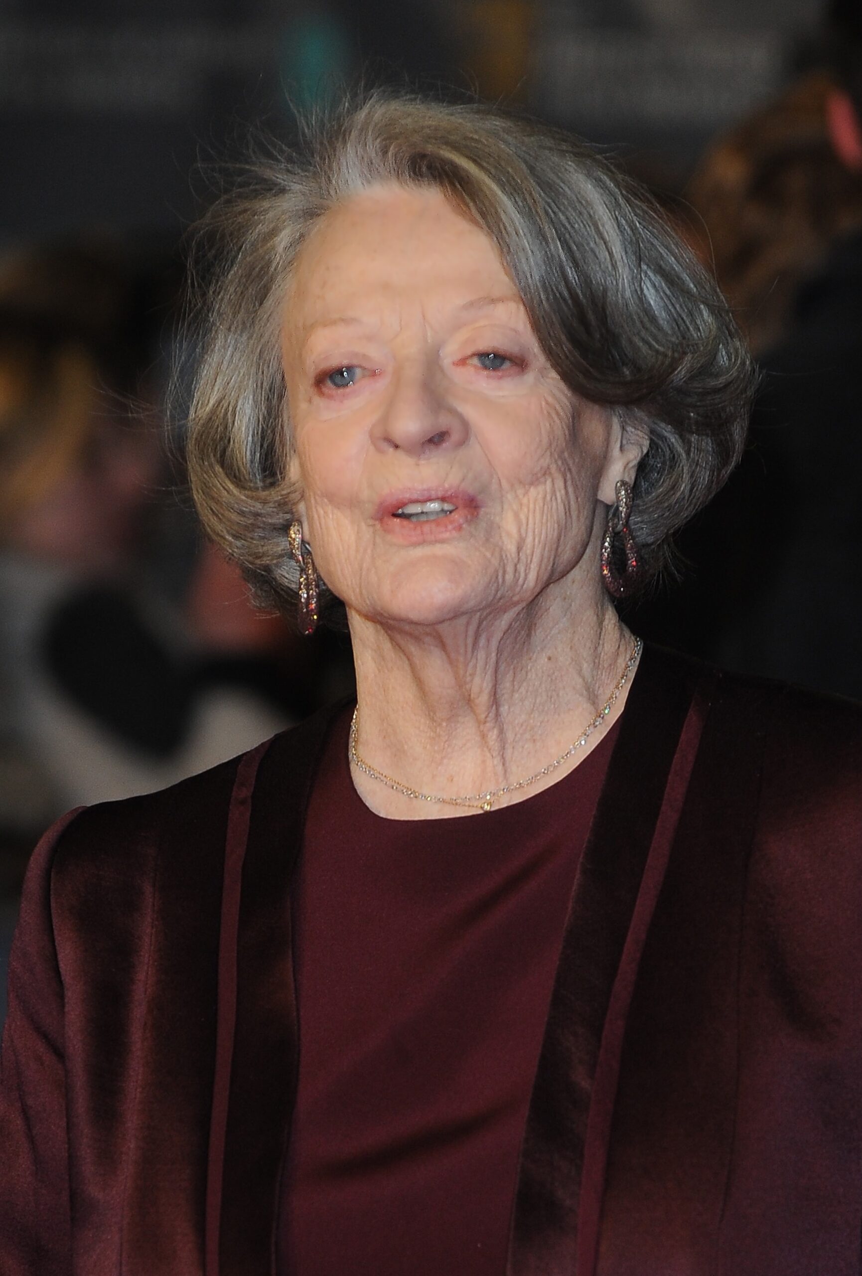 Maggie Smith smiling at event