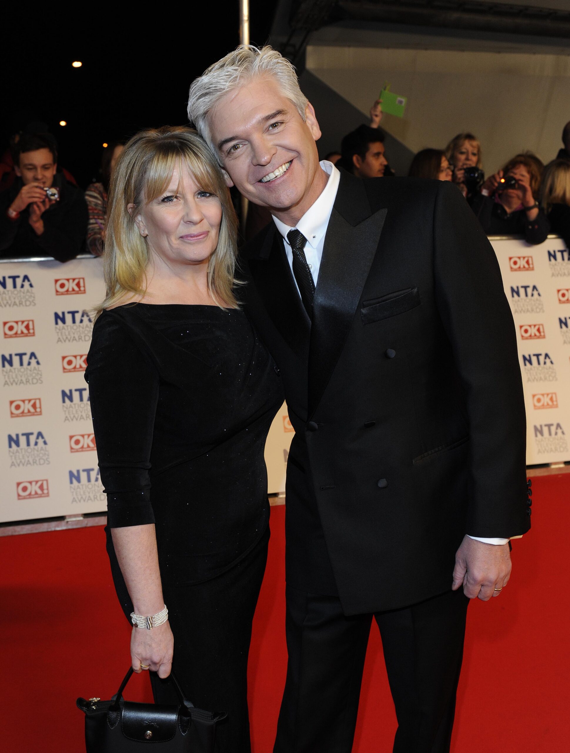 Phillip Schofield smiling with wife Steph