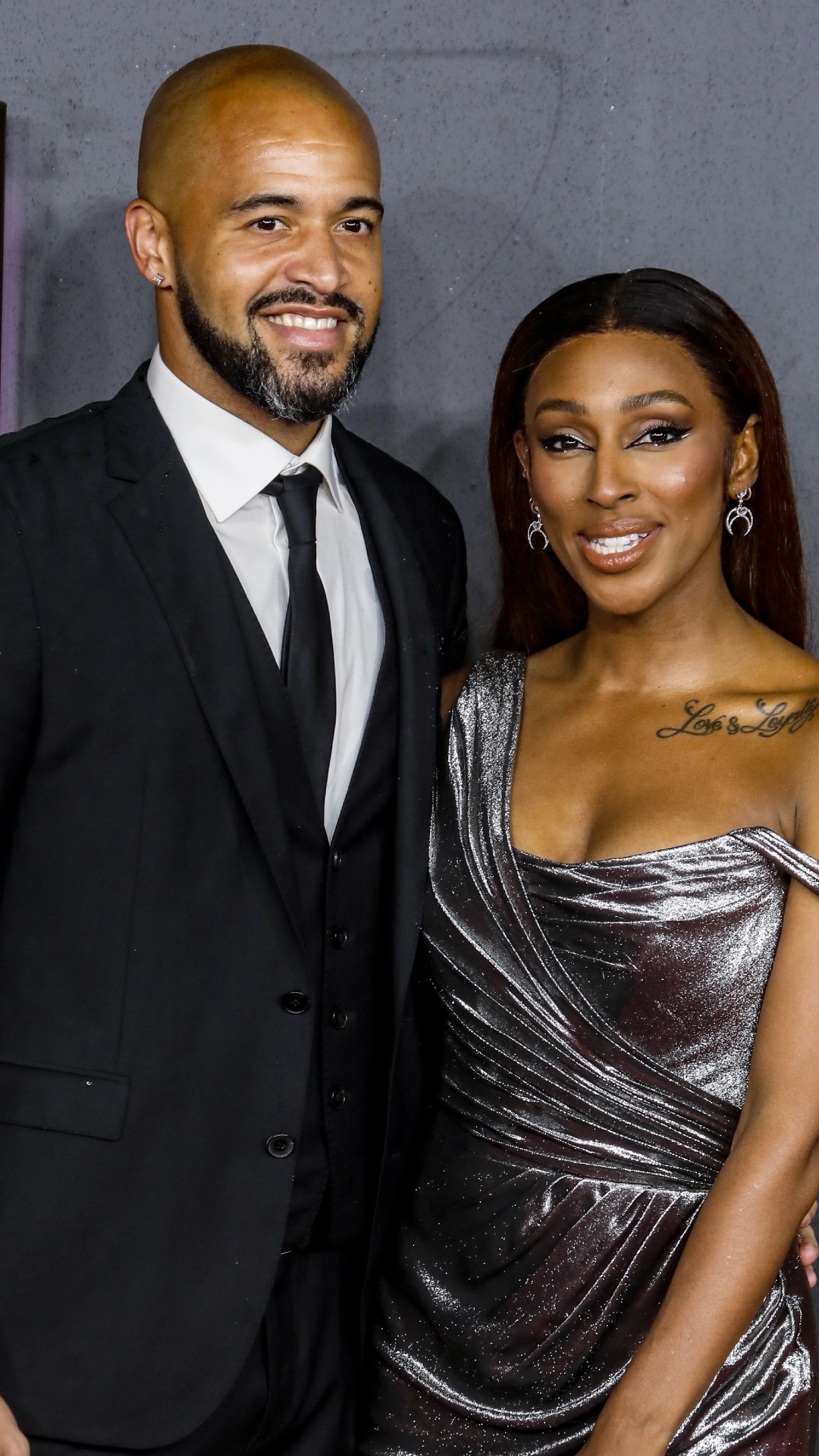 Alexandra Burke and her partner Darren