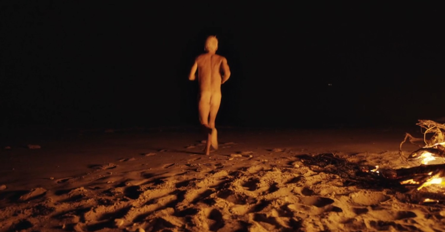 Phillip Schofield running naked on a beach on Cast Away