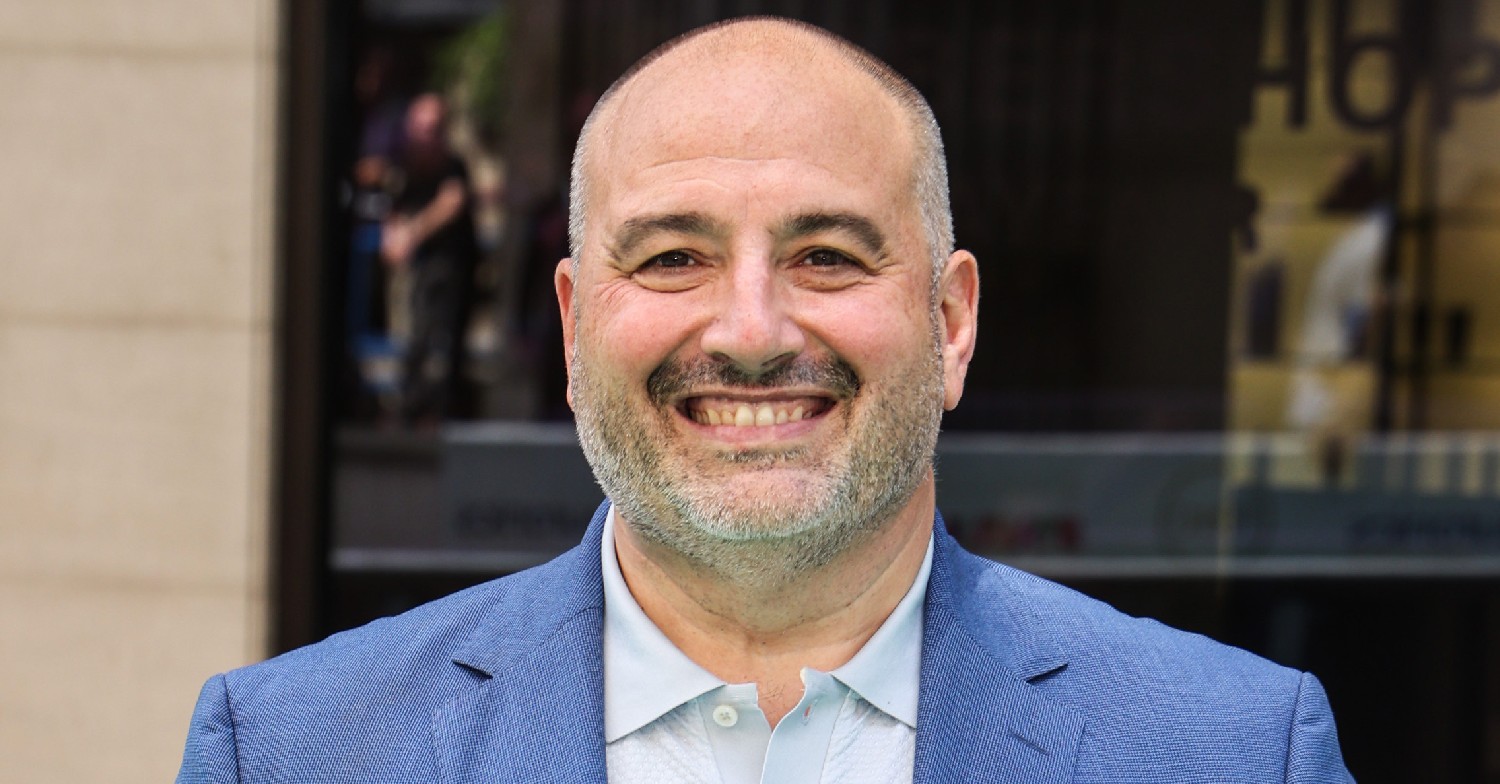 Wynne Evans smiling at event