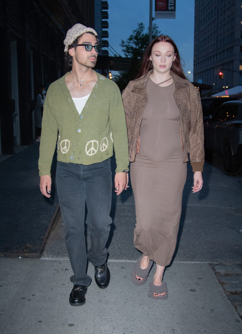 Joe Jonas and Sophie Turner holding hands