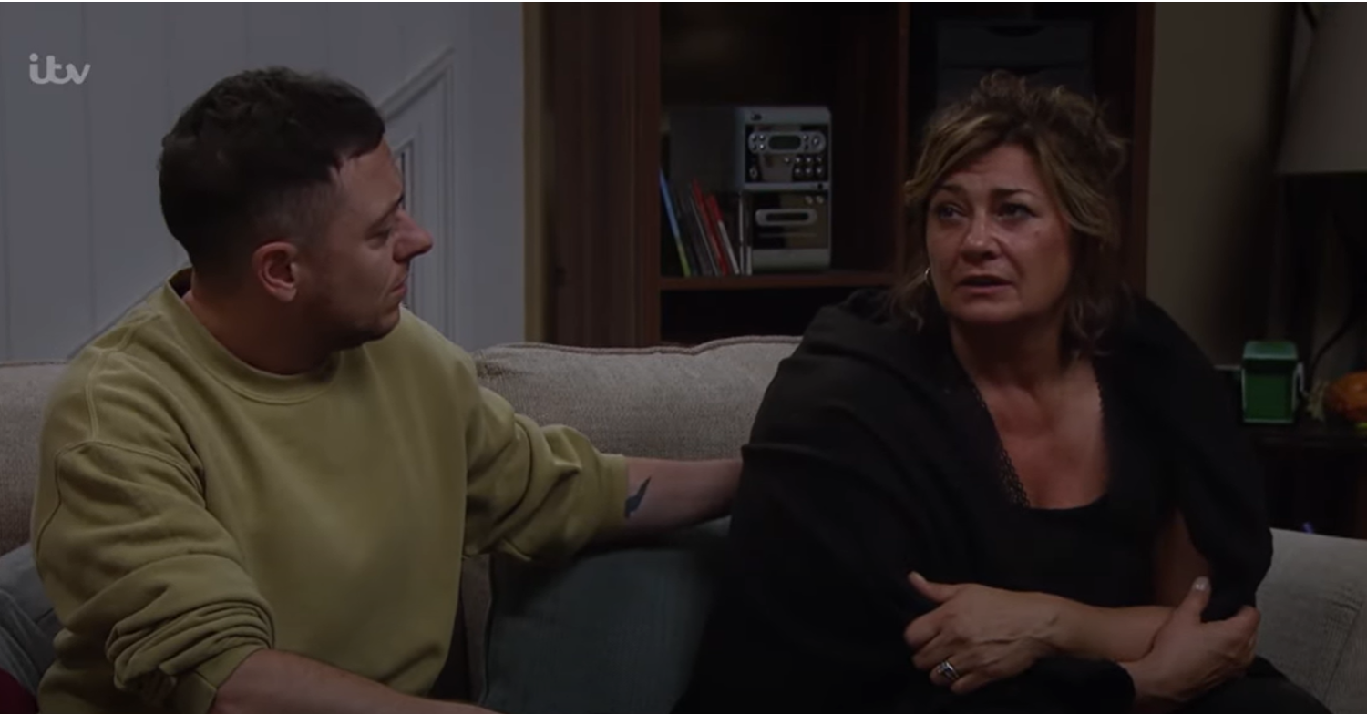 Moira looks upset as Matty comforts her on Emmerdale