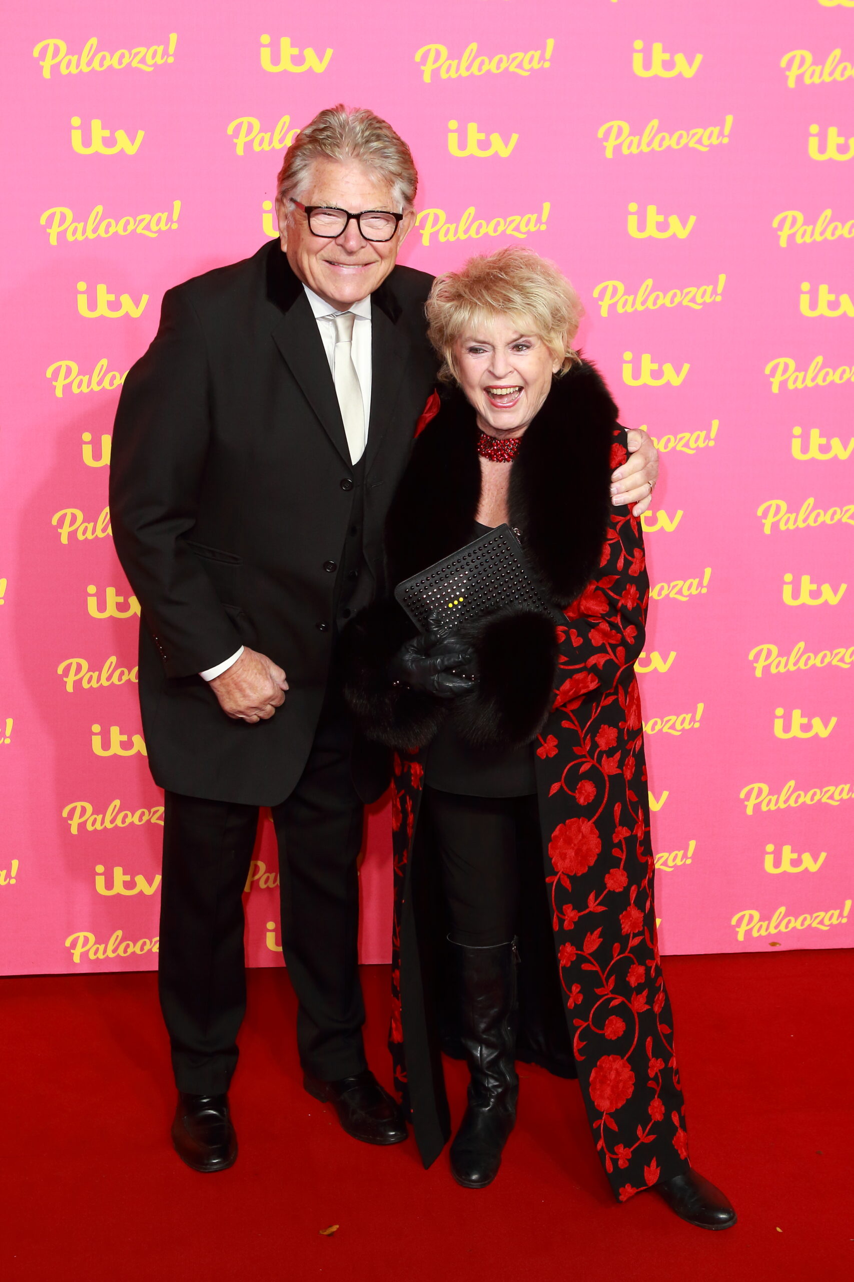 Gloria Hunniford laughing with her husband