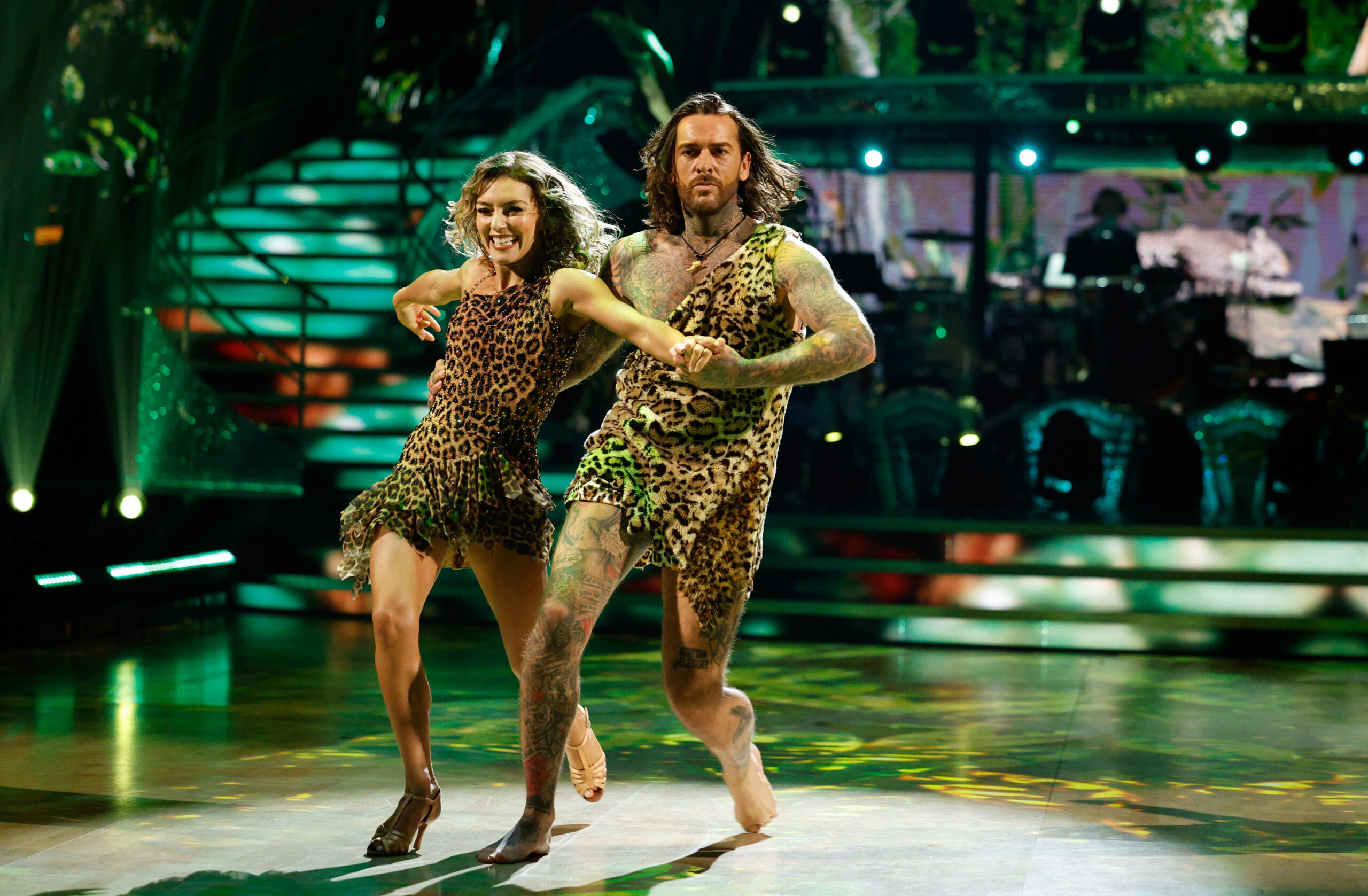 Pete and Jowita dancing in animal print on Strictly
