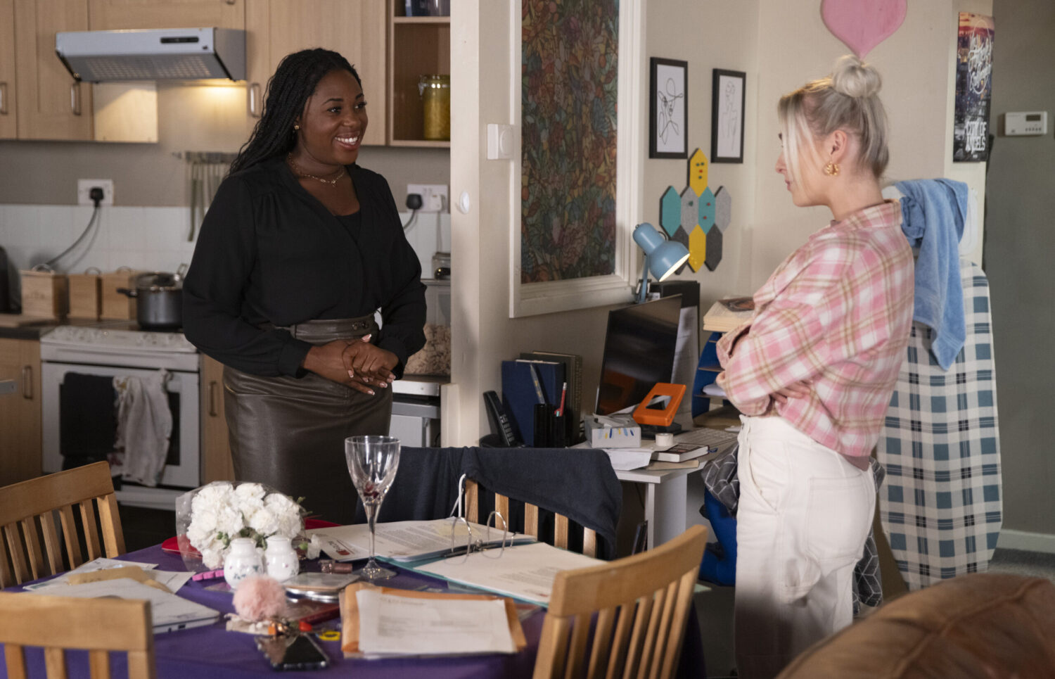 Dee-Dee and Lauren smiling in the flat