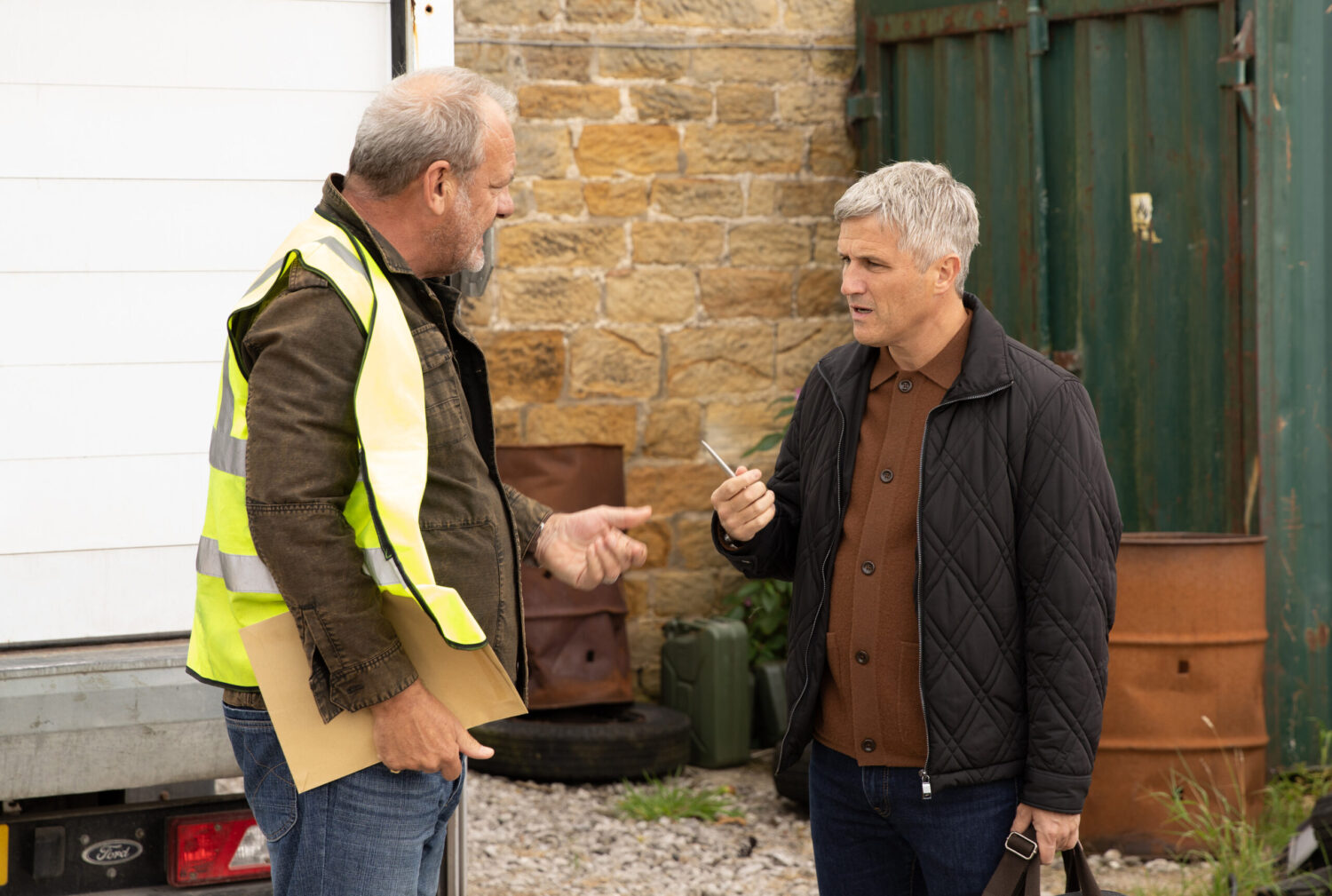 Caleb and Jimmy talking at the Haulage yard