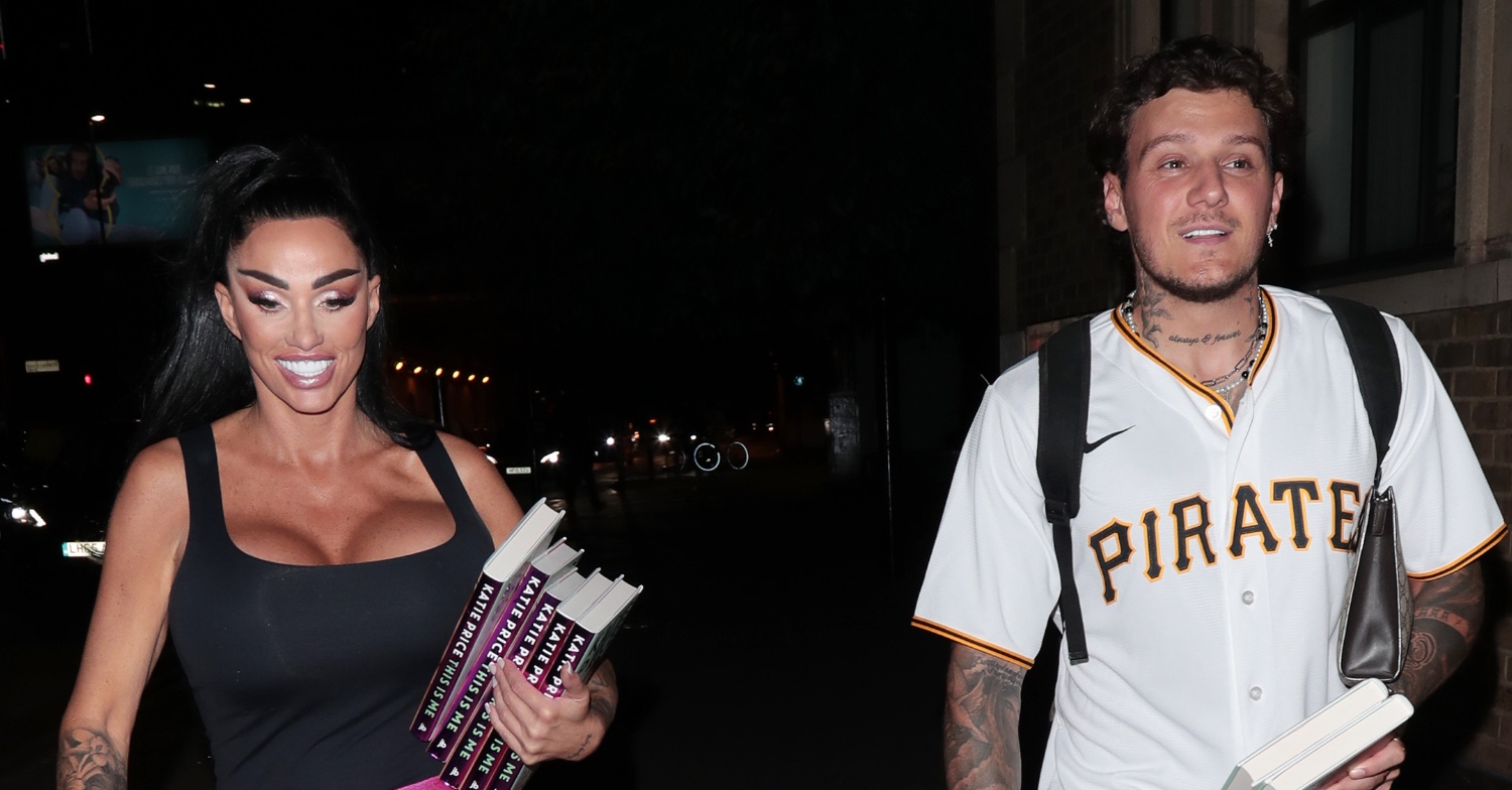 Katie Price and JJ Slater walking together and smiling