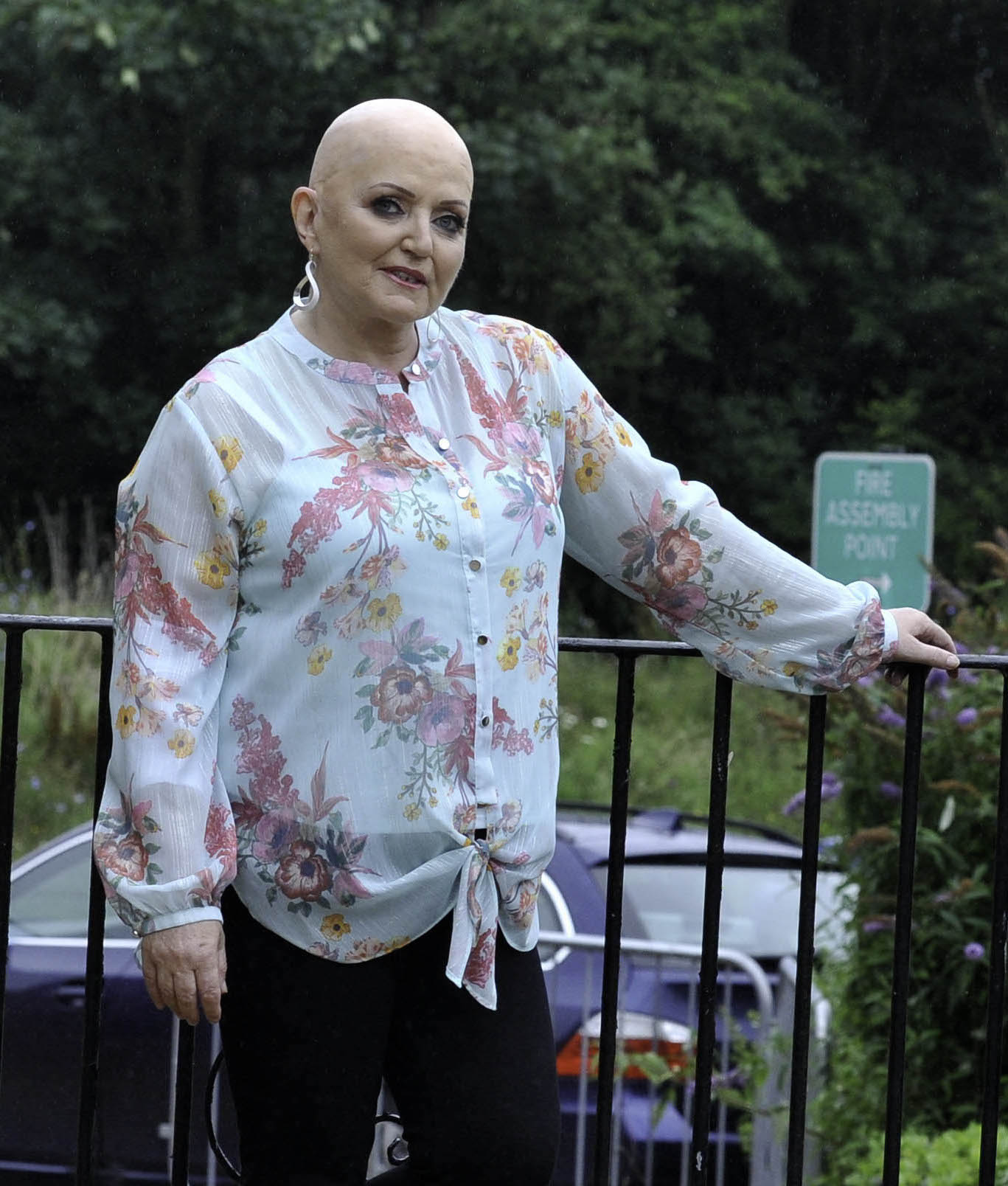 Linda Nolan having lost her hair in a floral top