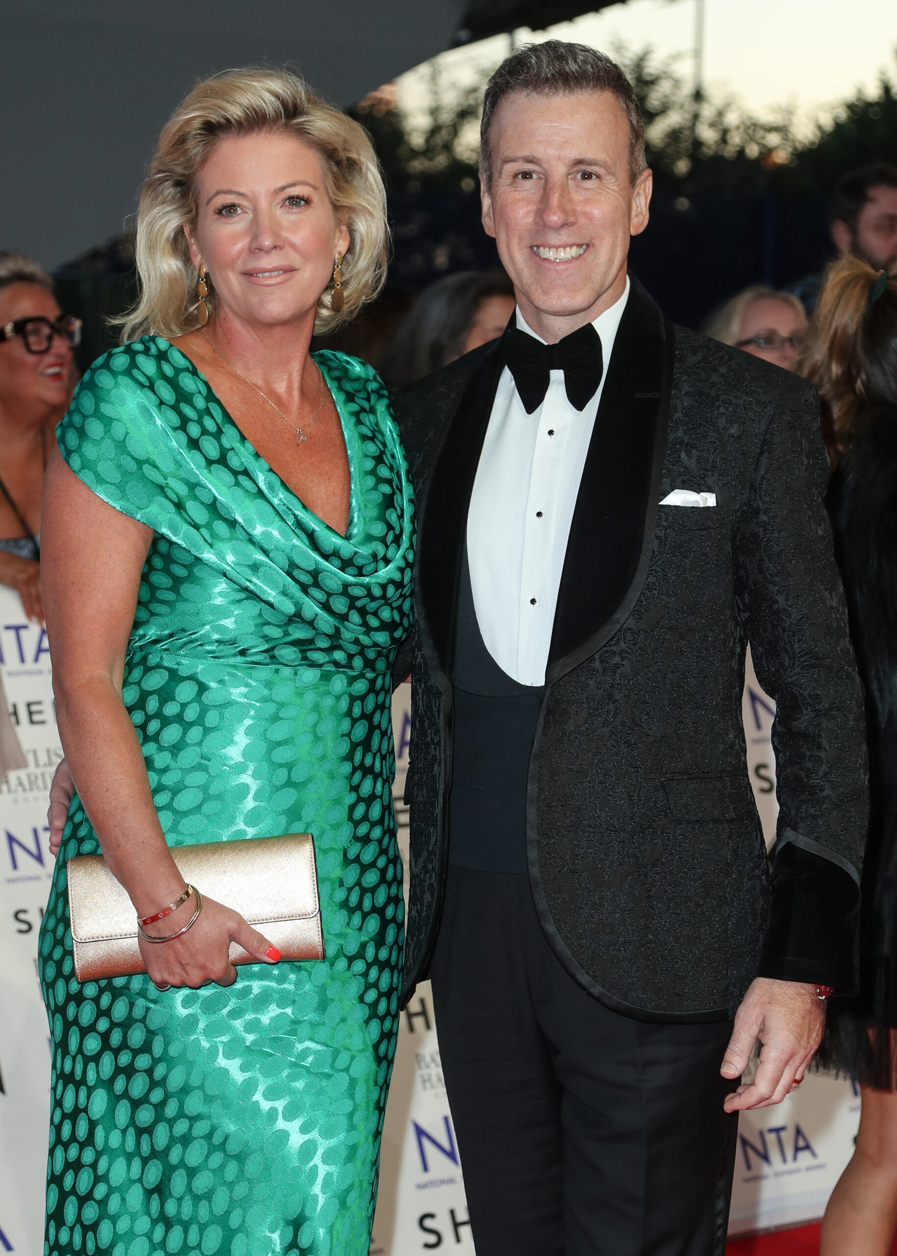 Anton and wife smiling