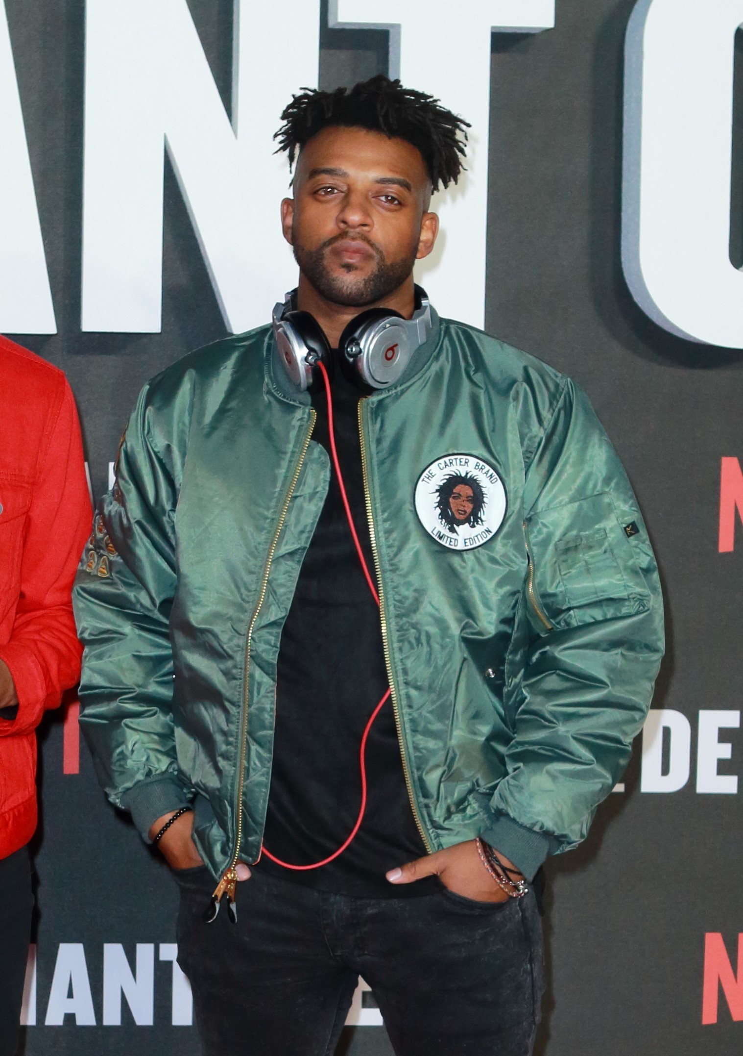 Oritse Williams posing at event