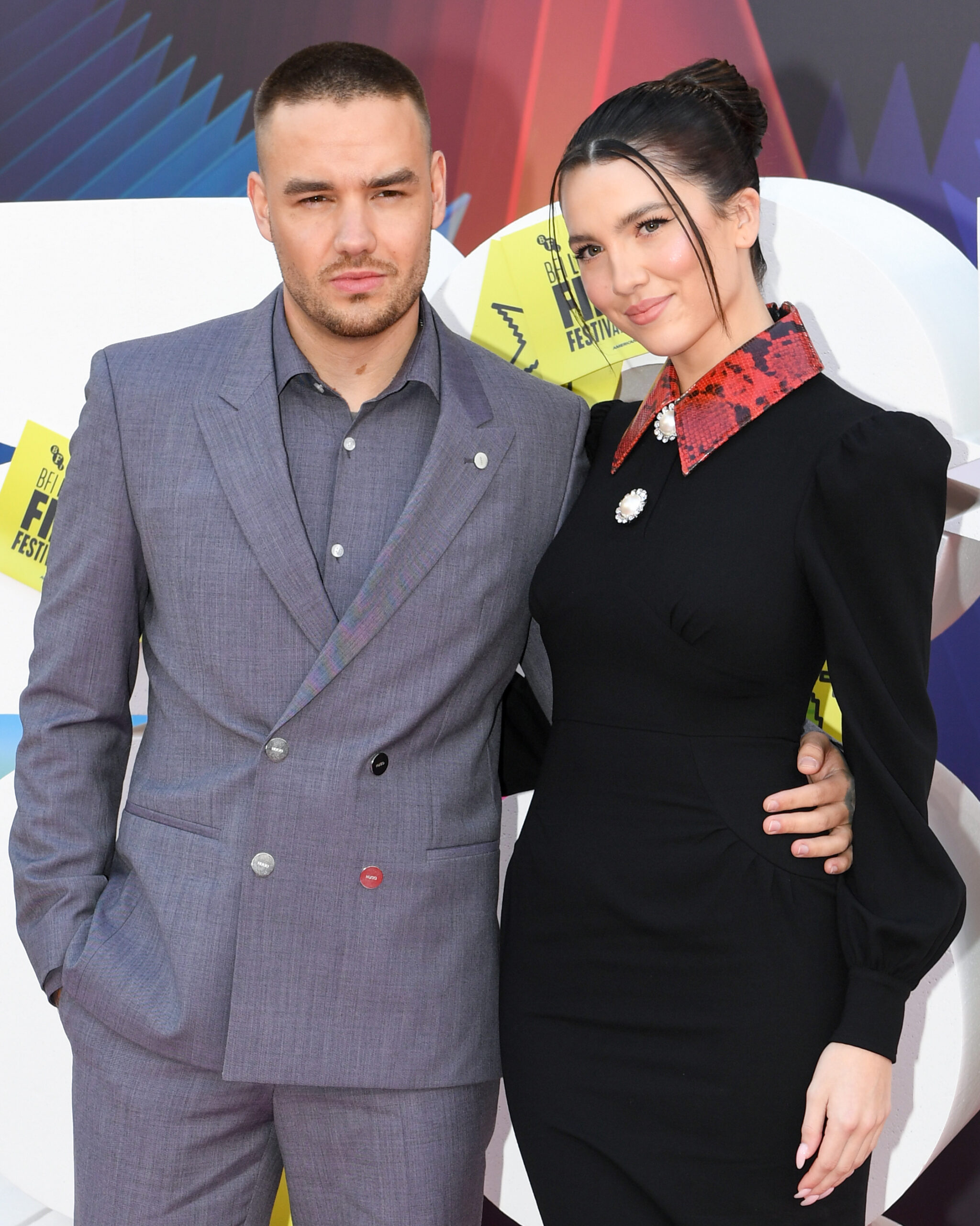 Liam Payne and Maya Henry looking to camera