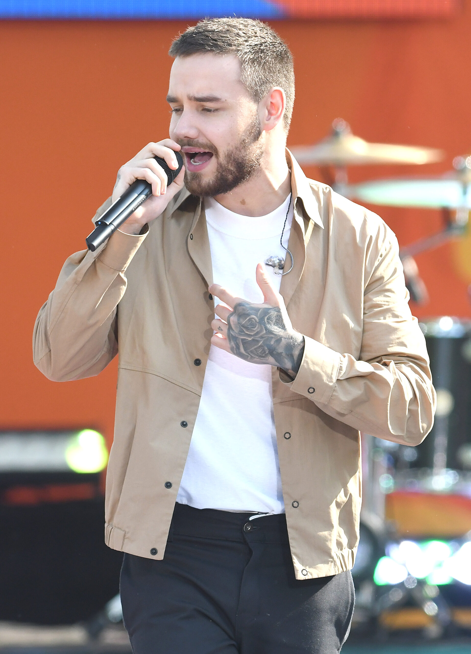 Liam Payne singing on stage