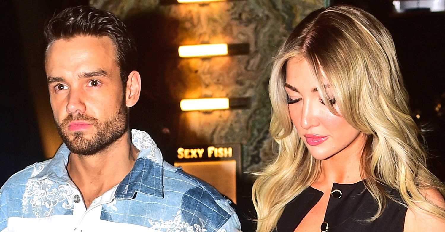 Liam Payne frowning beside girlfriend Kate Cassidy looking down
