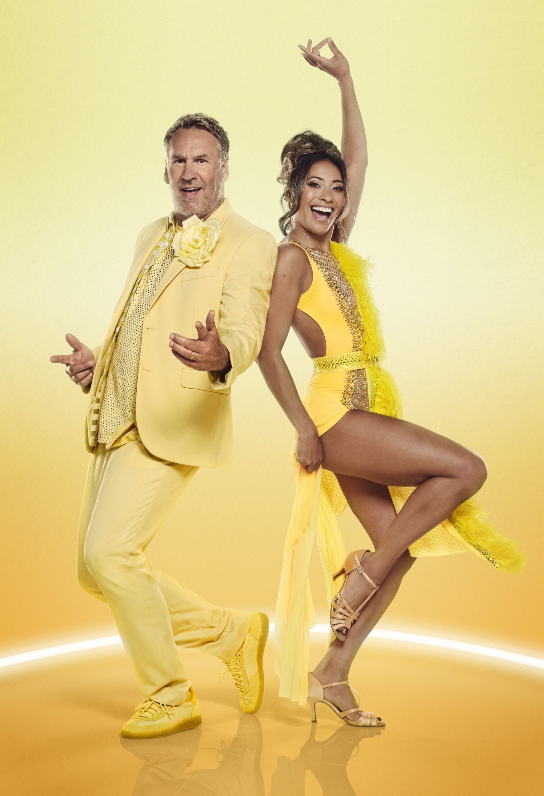Paul Merson and Karen Hauer smiling in Strictly promo pic