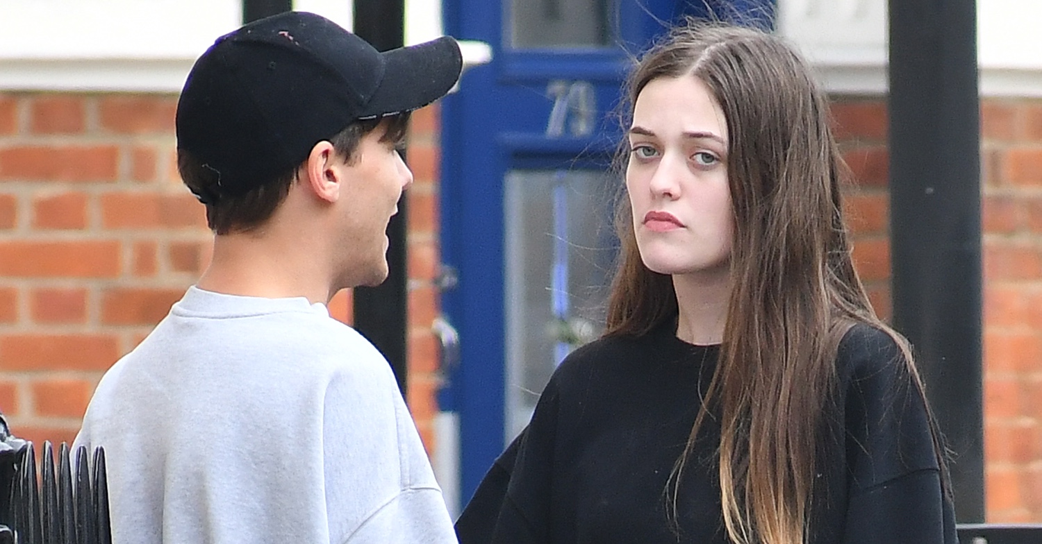 Louis and Felicite Tomlinson talking on the street