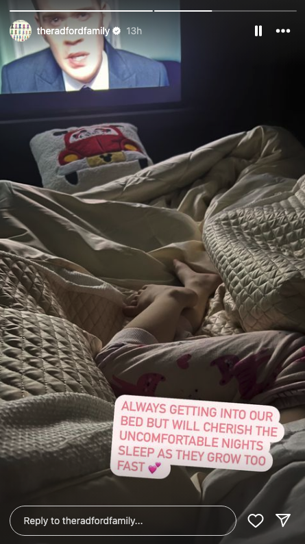 Sue and Noel Radford's bed with a child between them