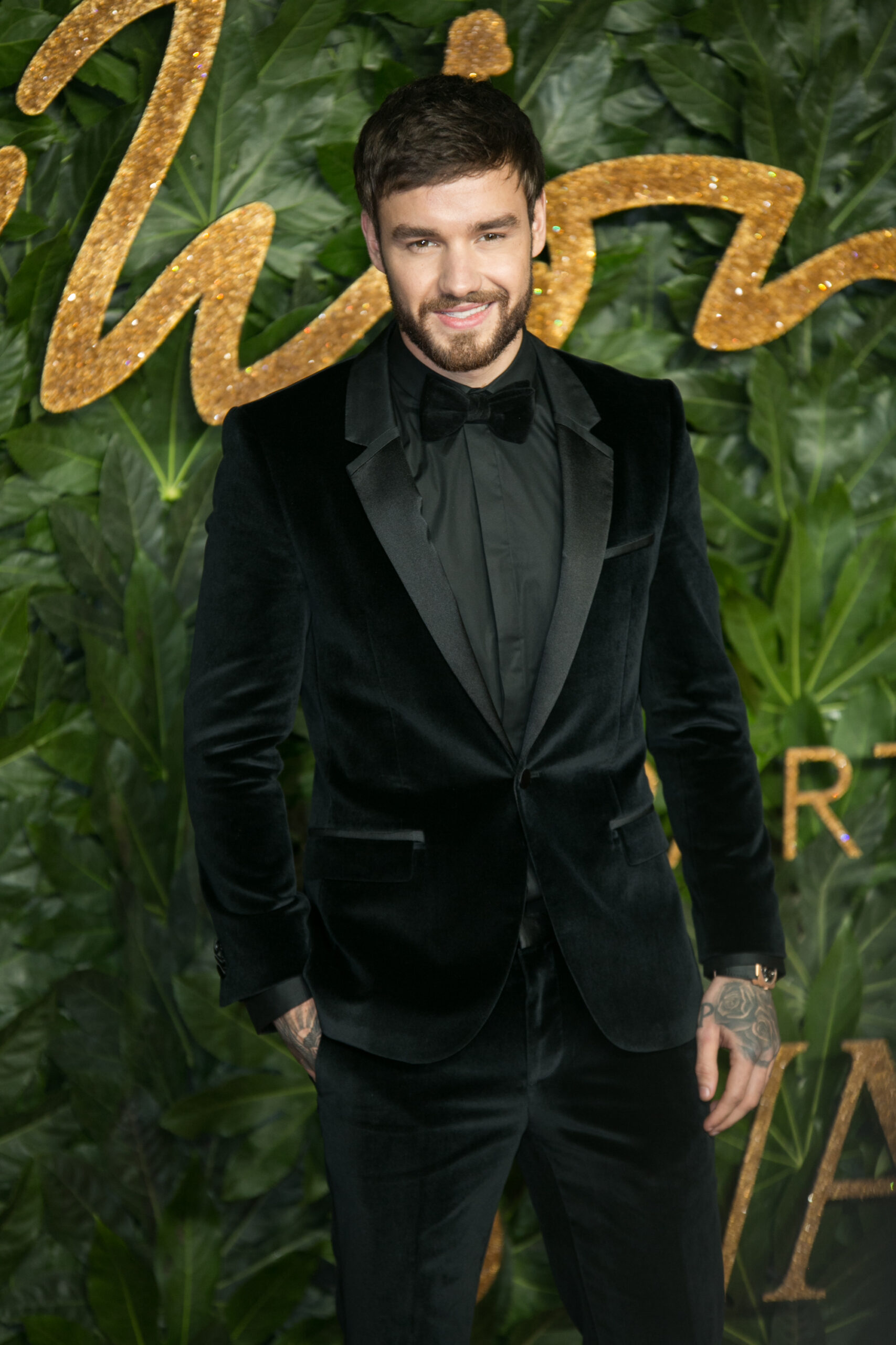 Liam Payne smiling at a red carpet event