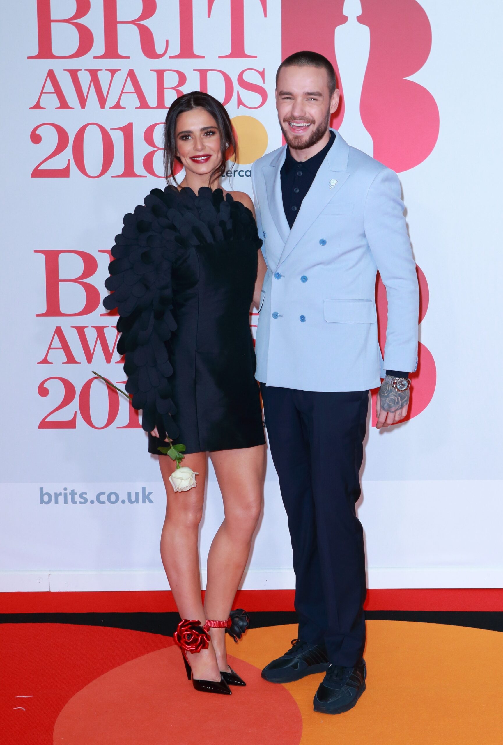 Cheryl and Liam Payne smiling at the BRITs