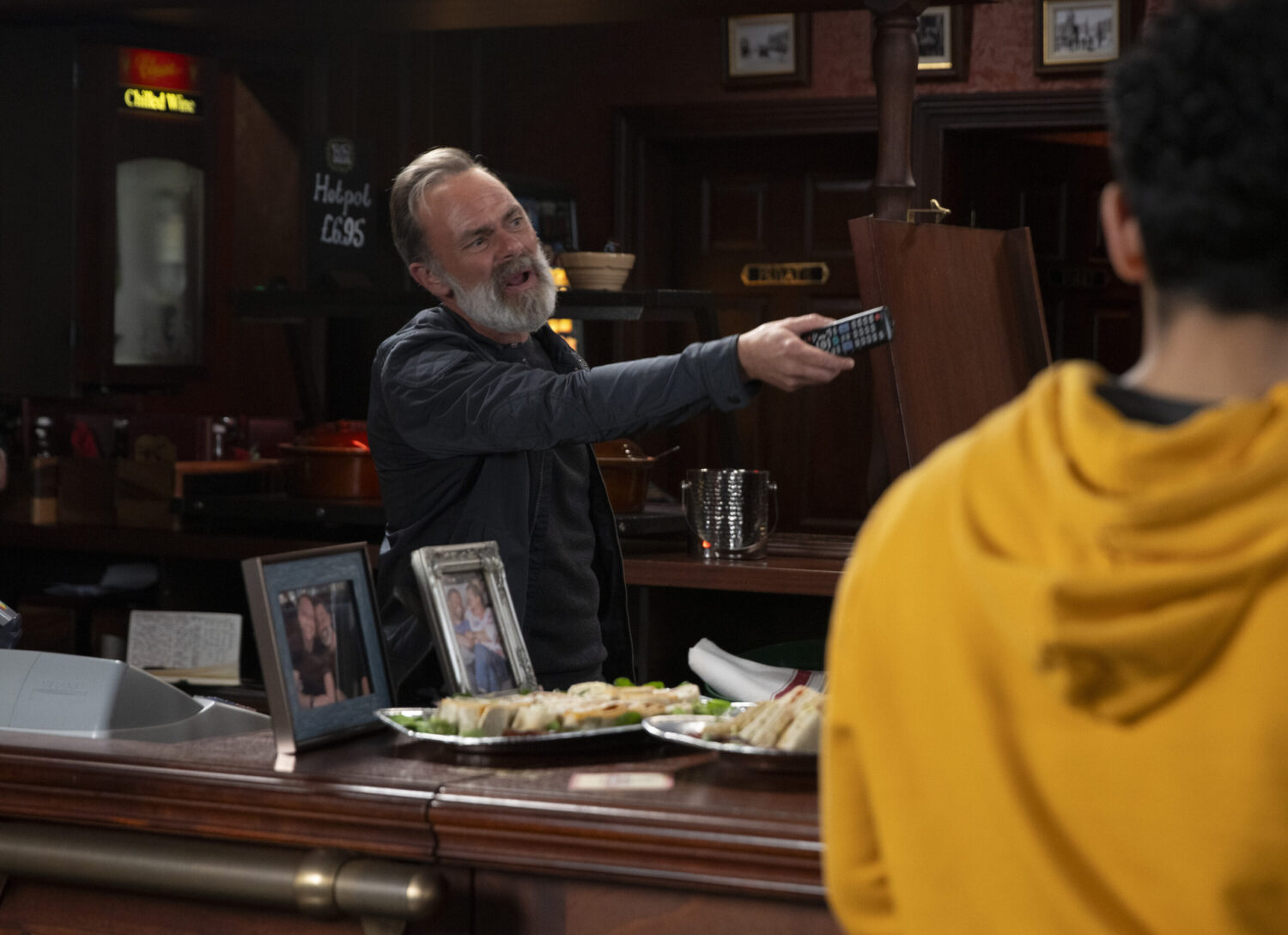 Billy is grieving in the pub