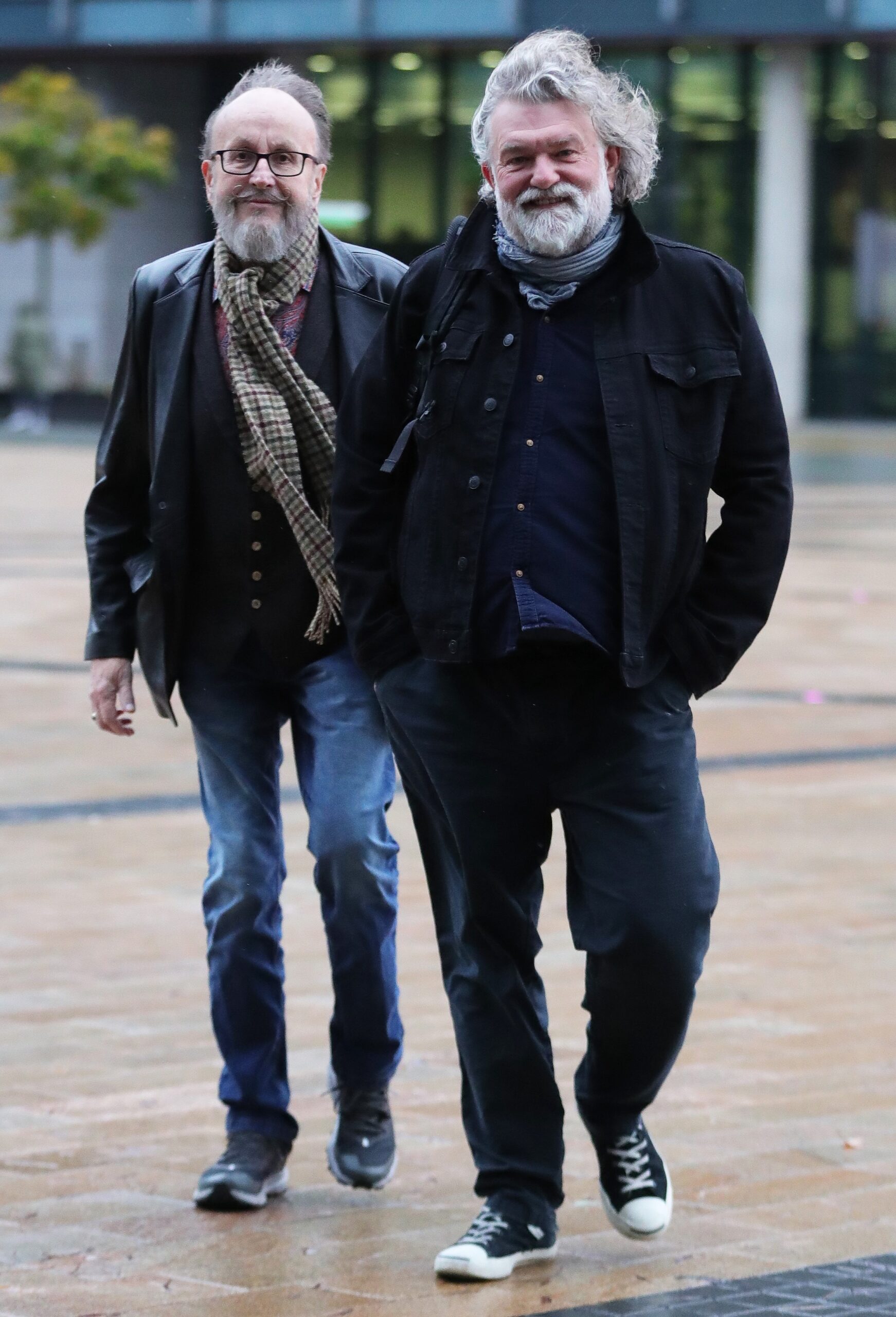 Dave Myers and Si King walking outside