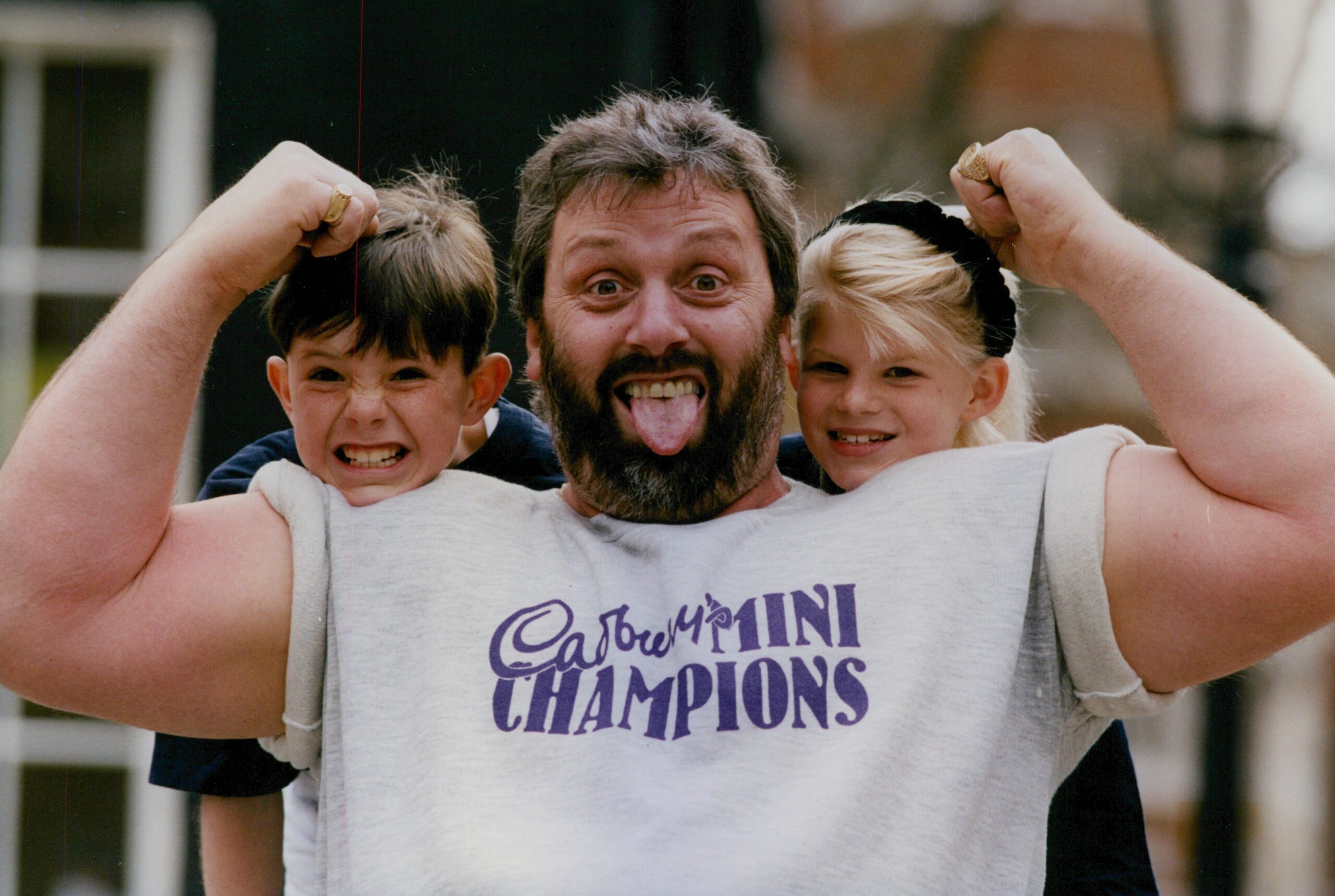Geoff Capes flexing his muscles