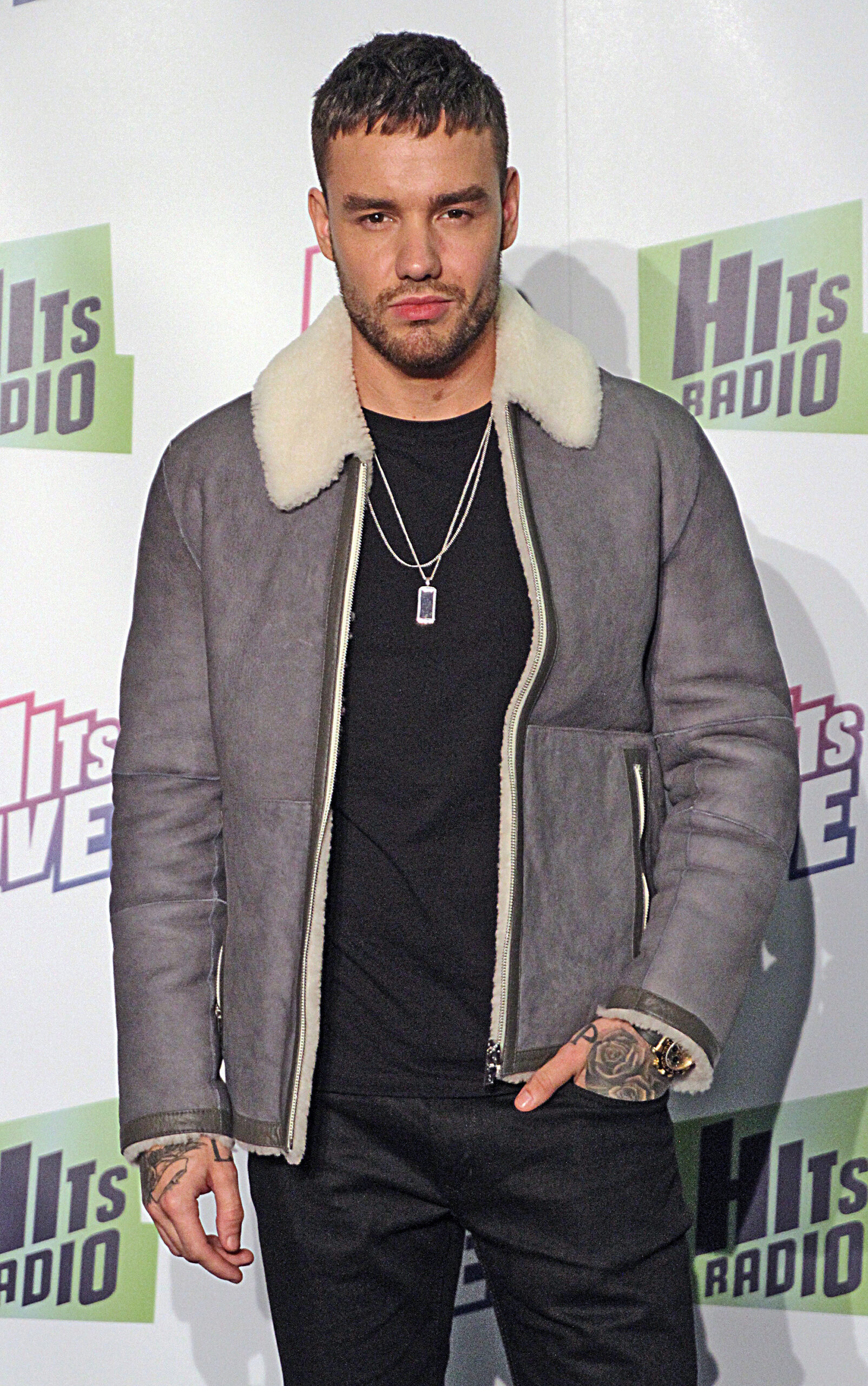 Liam Payne smiling on a red carpet