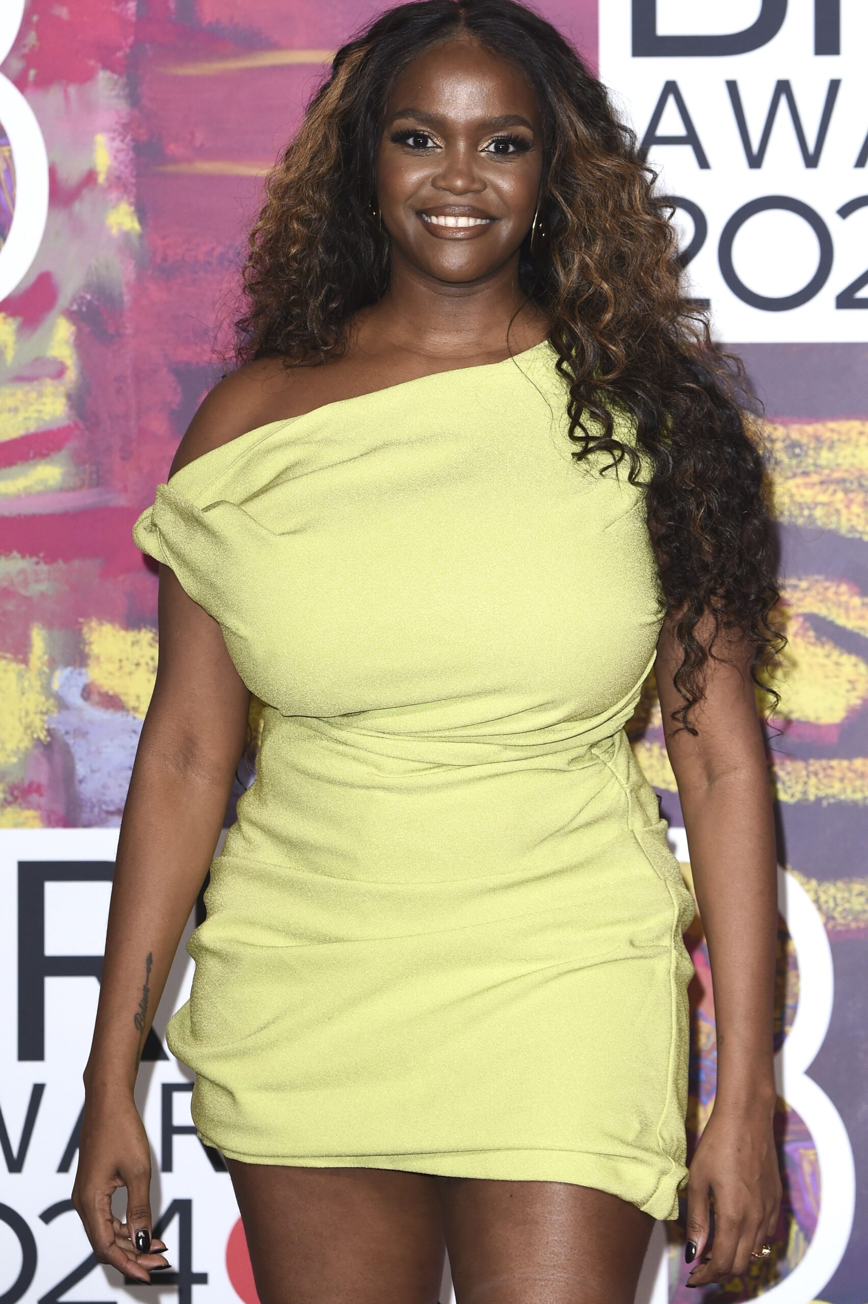 Oti Mabuse smiling at the BRIT Awards