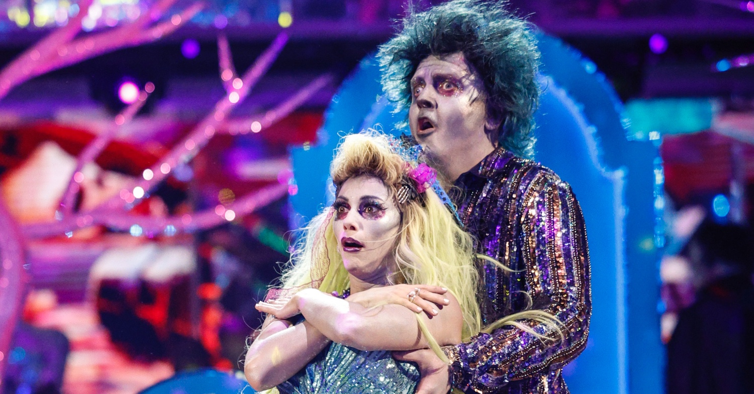 Chris McCausland and Dianne Buswell wearing zombie outfits and dancing on Strictly
